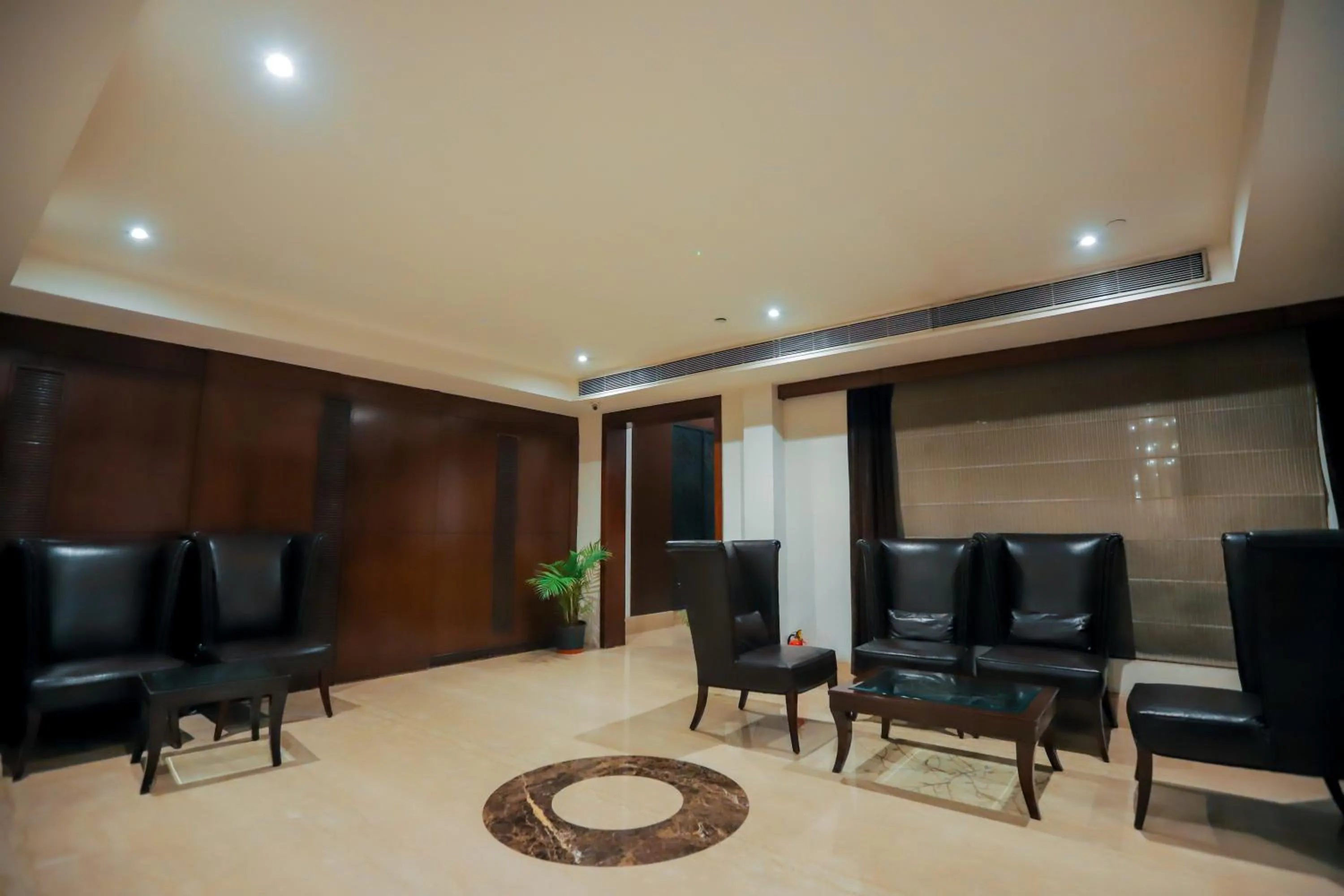 Seating area in Bel-La Monde Hotel NH8 at 6km from IGI Airport Delhi