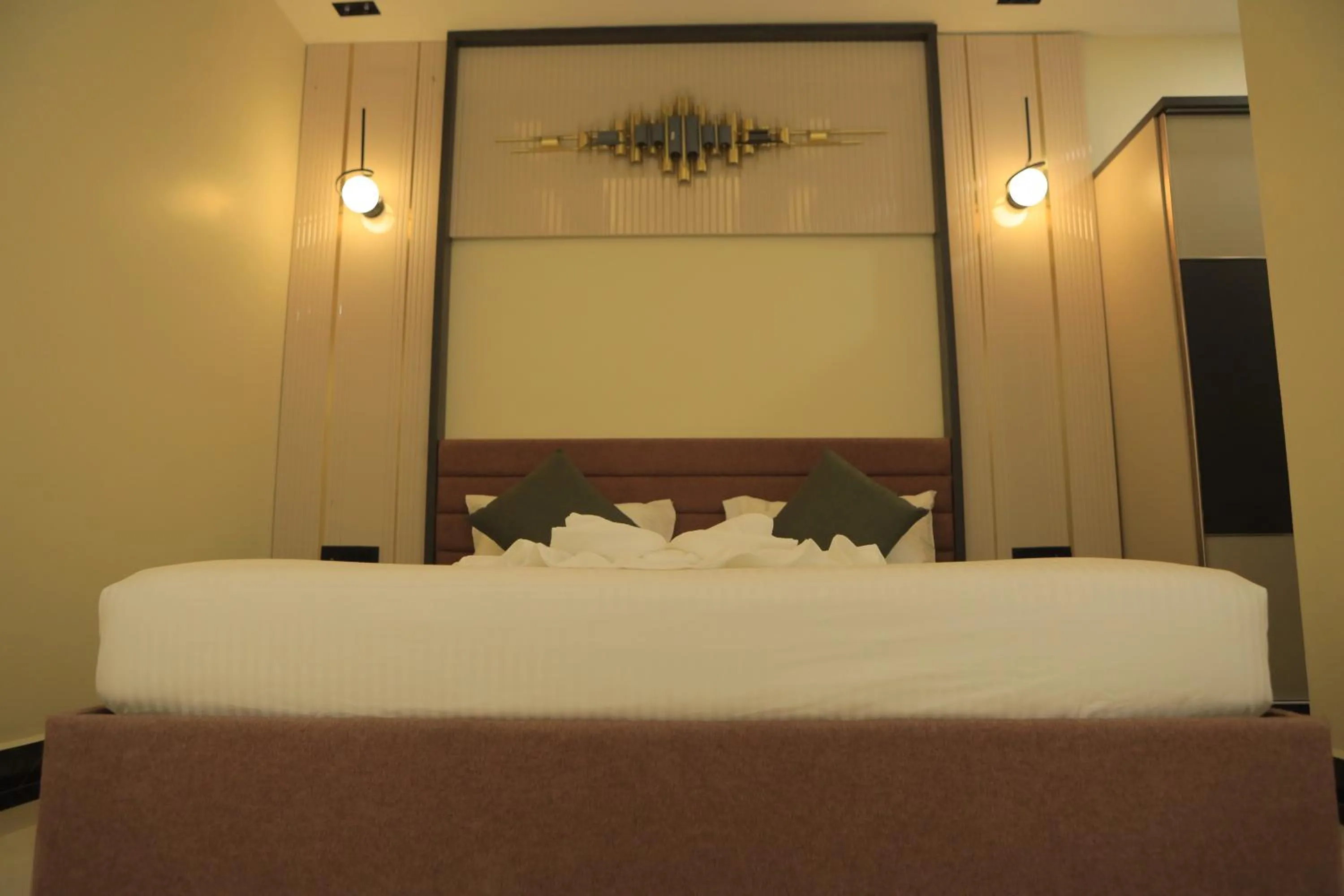 Bed in KANS ONE - Hotel & Banquets