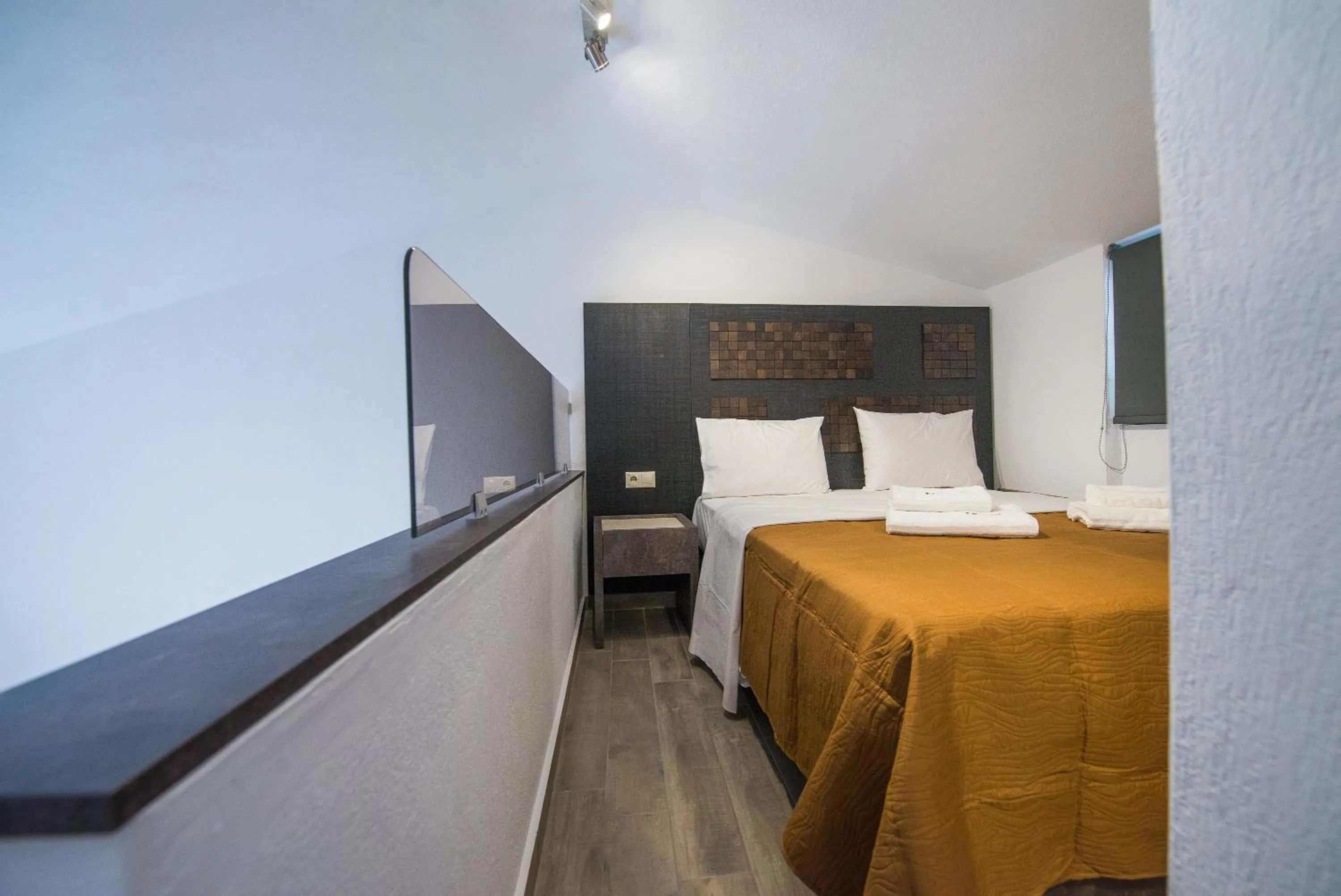 Bed in Chasapis Luxury Apartments&Studios