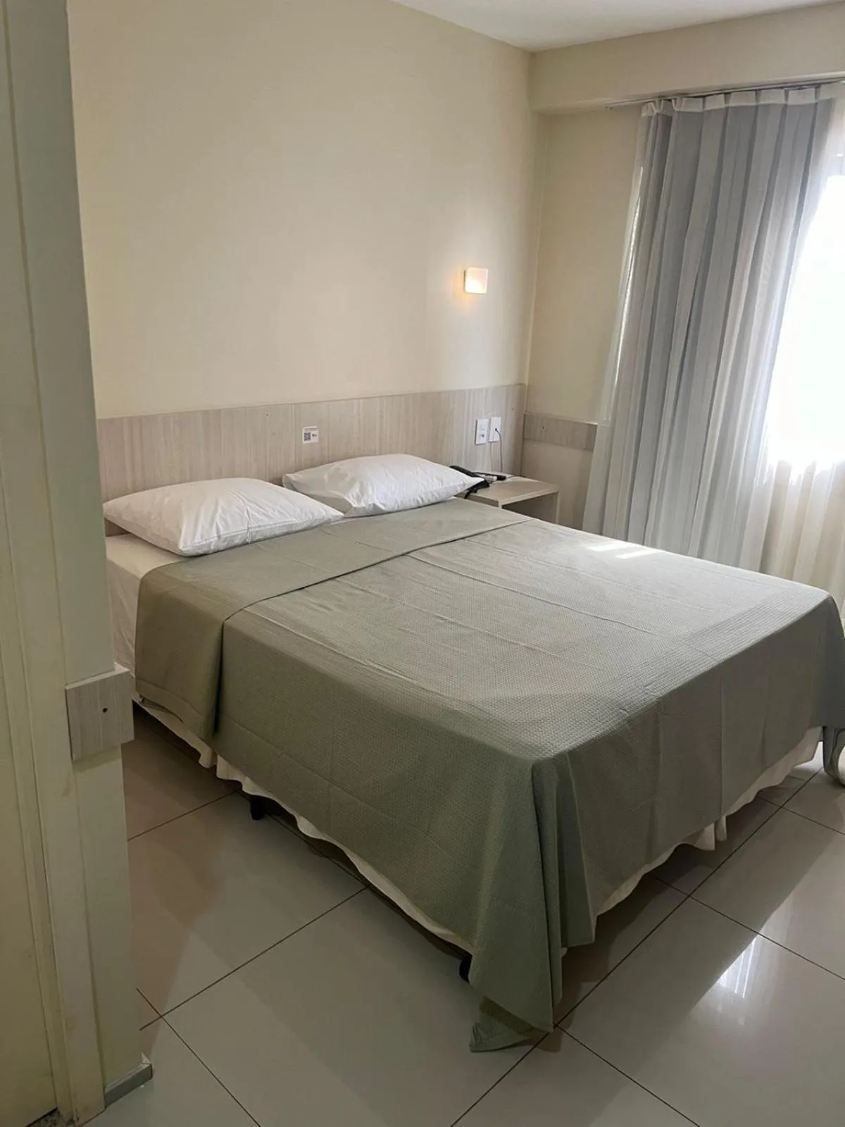 Bed in Stay Inn Hotel