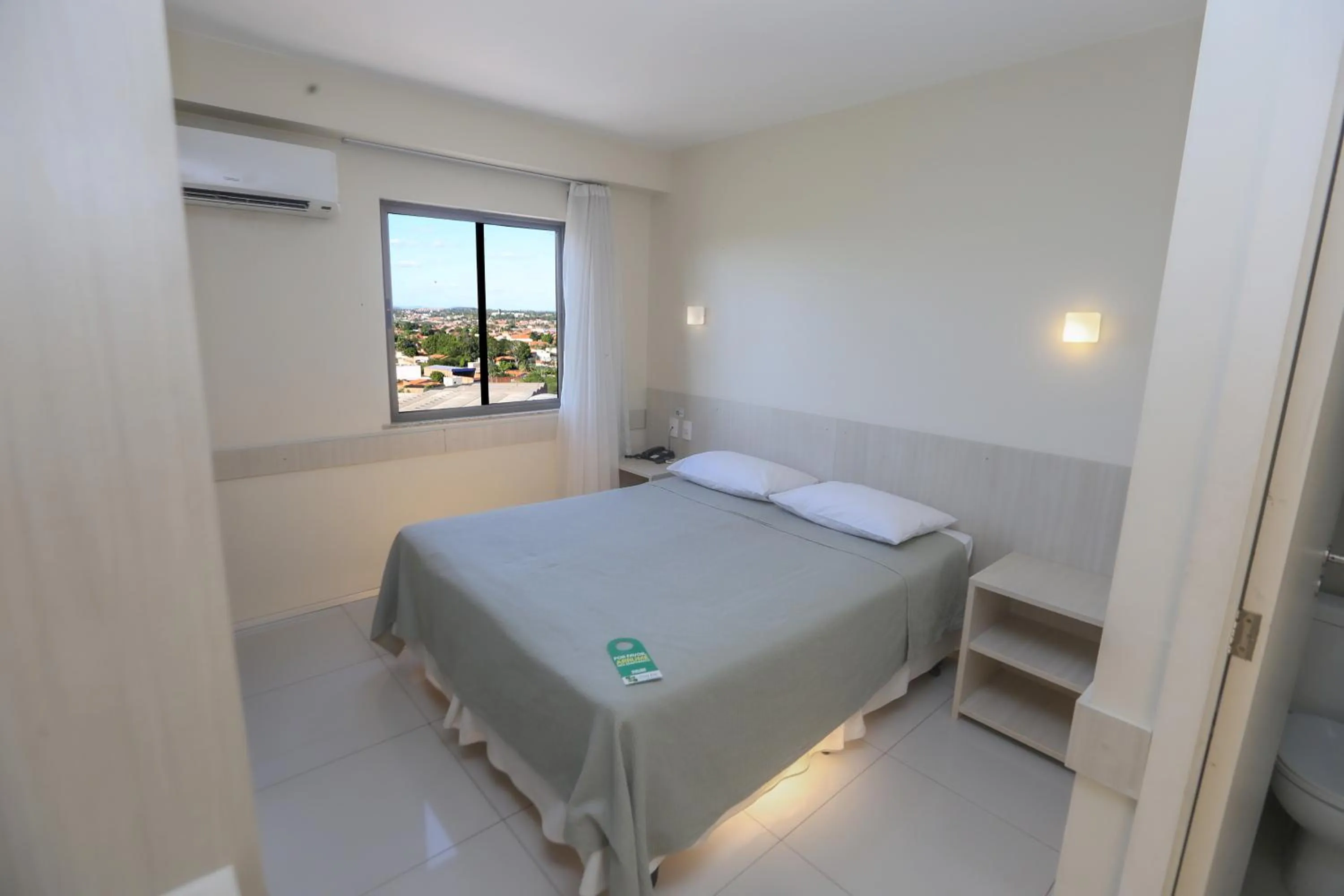 Bed in Stay Inn Hotel