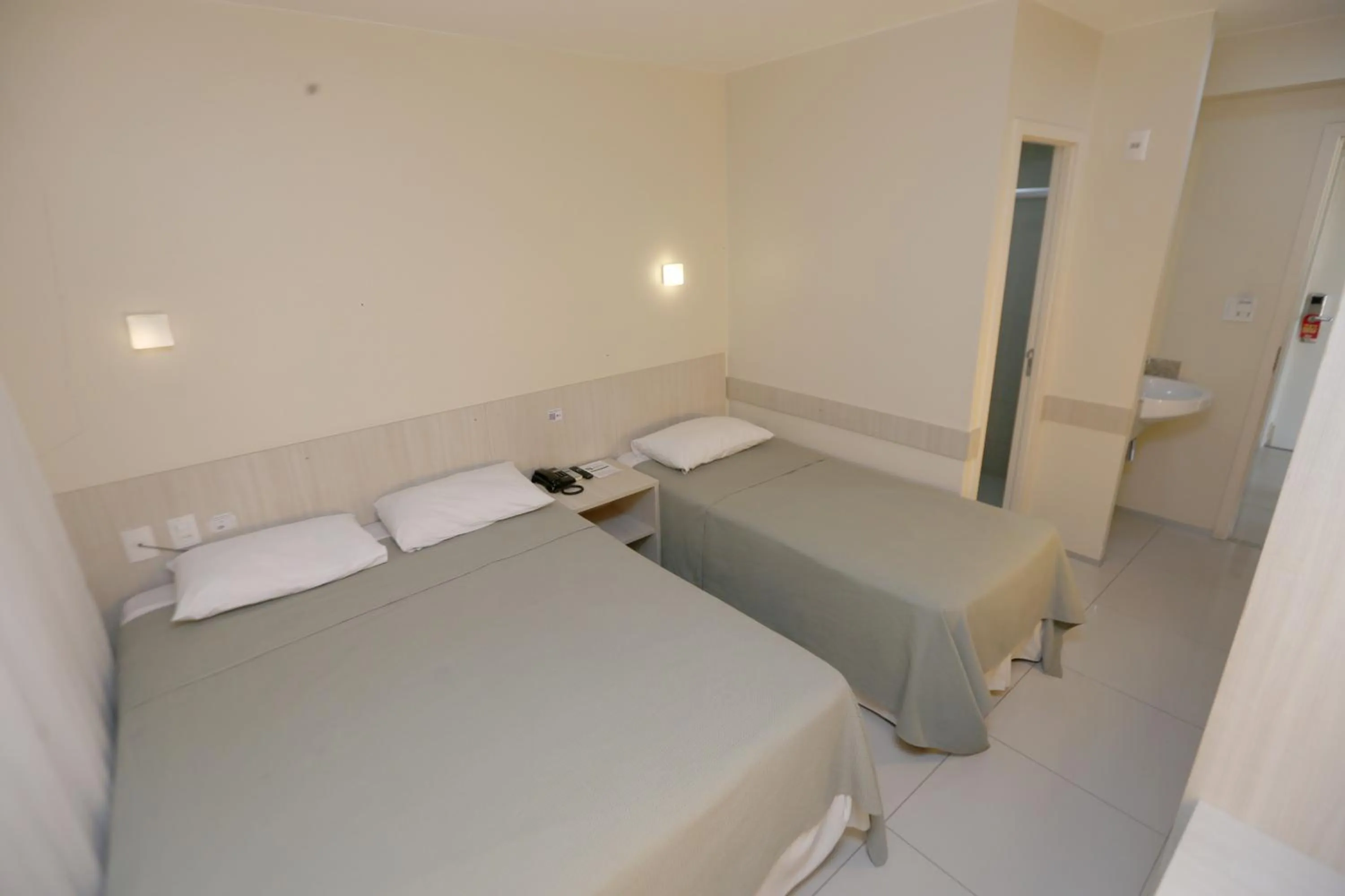 Bed in Stay Inn Hotel