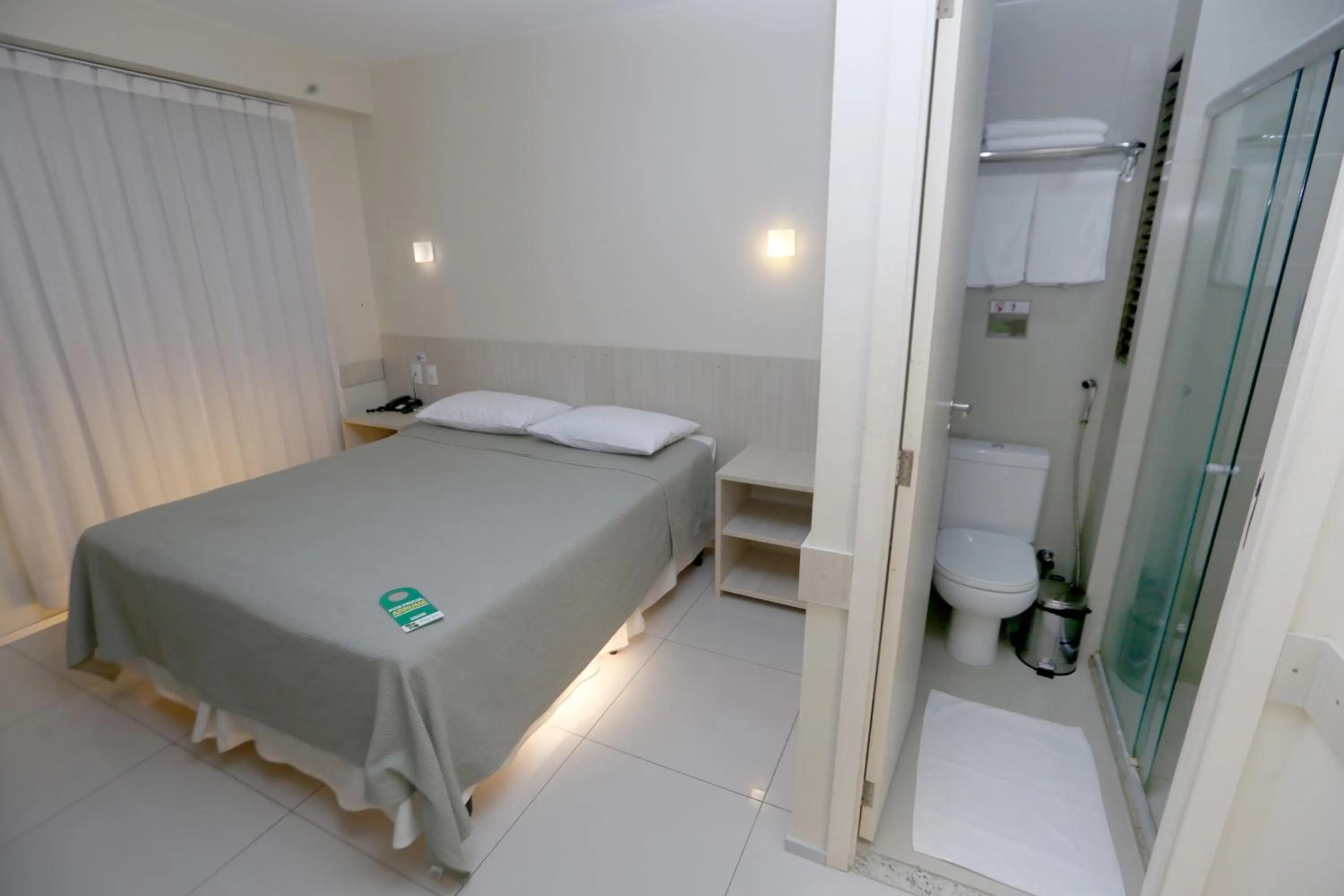 Bed in Stay Inn Hotel