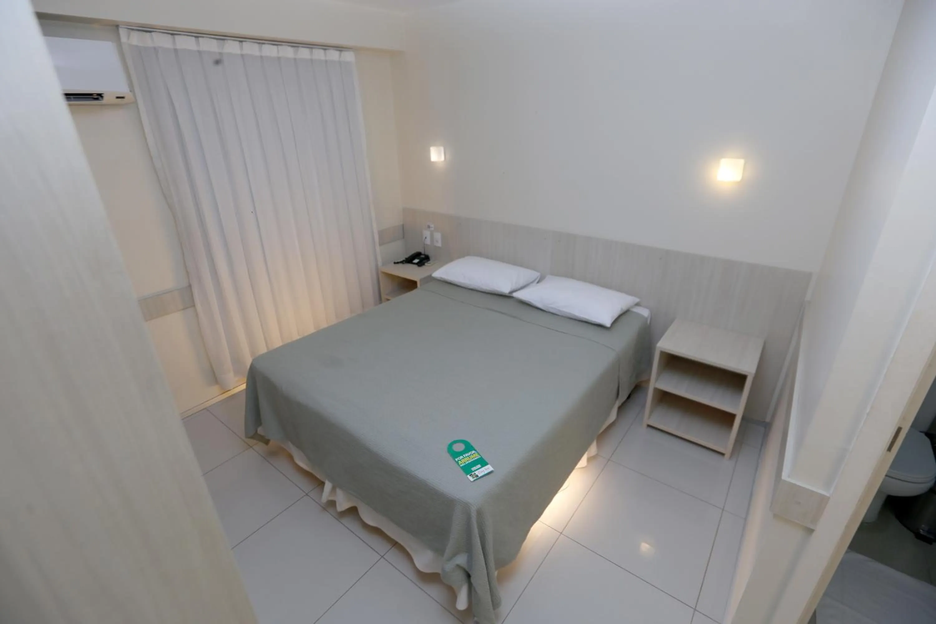 Bed in Stay Inn Hotel