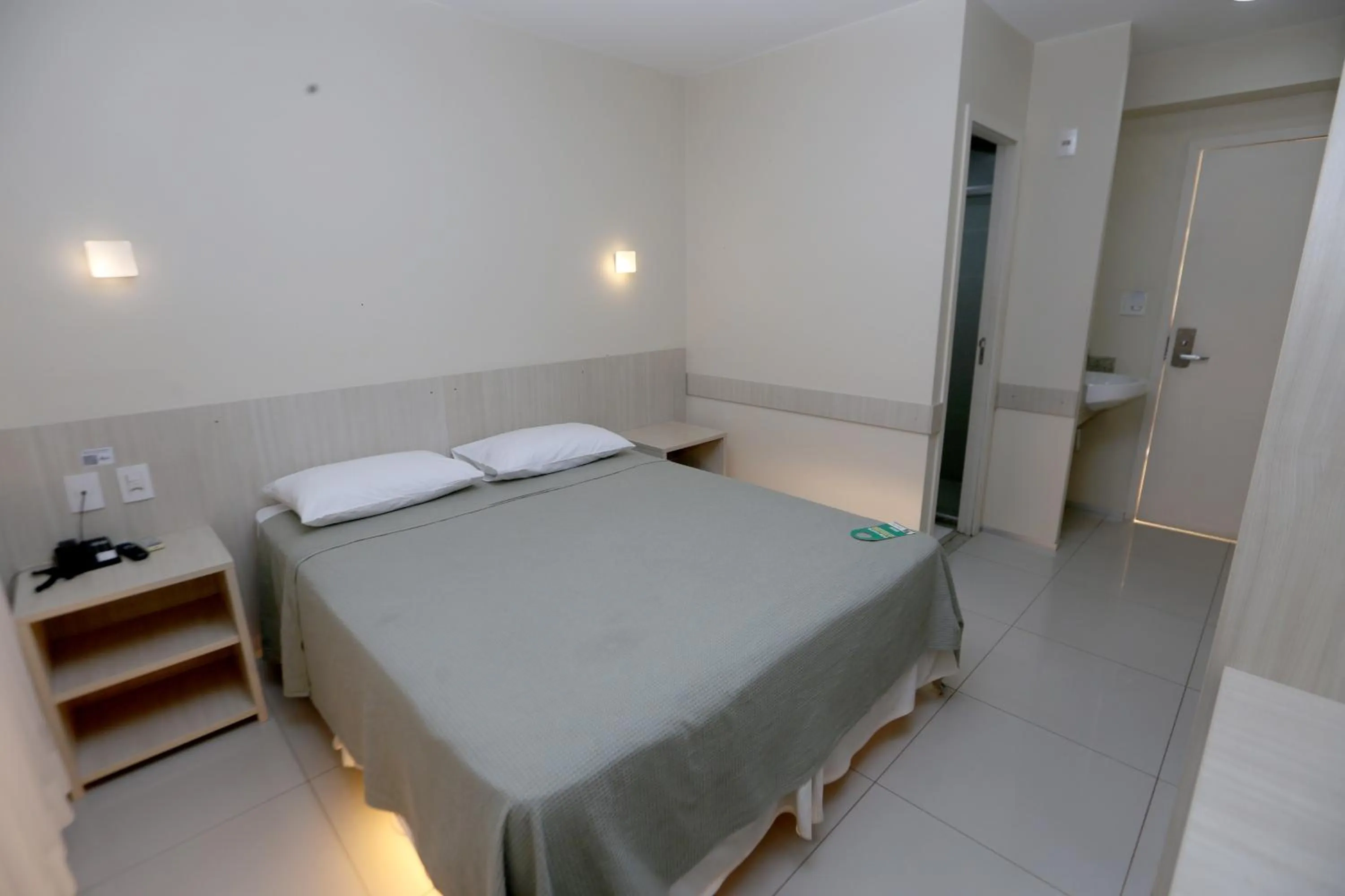 Bed in Stay Inn Hotel