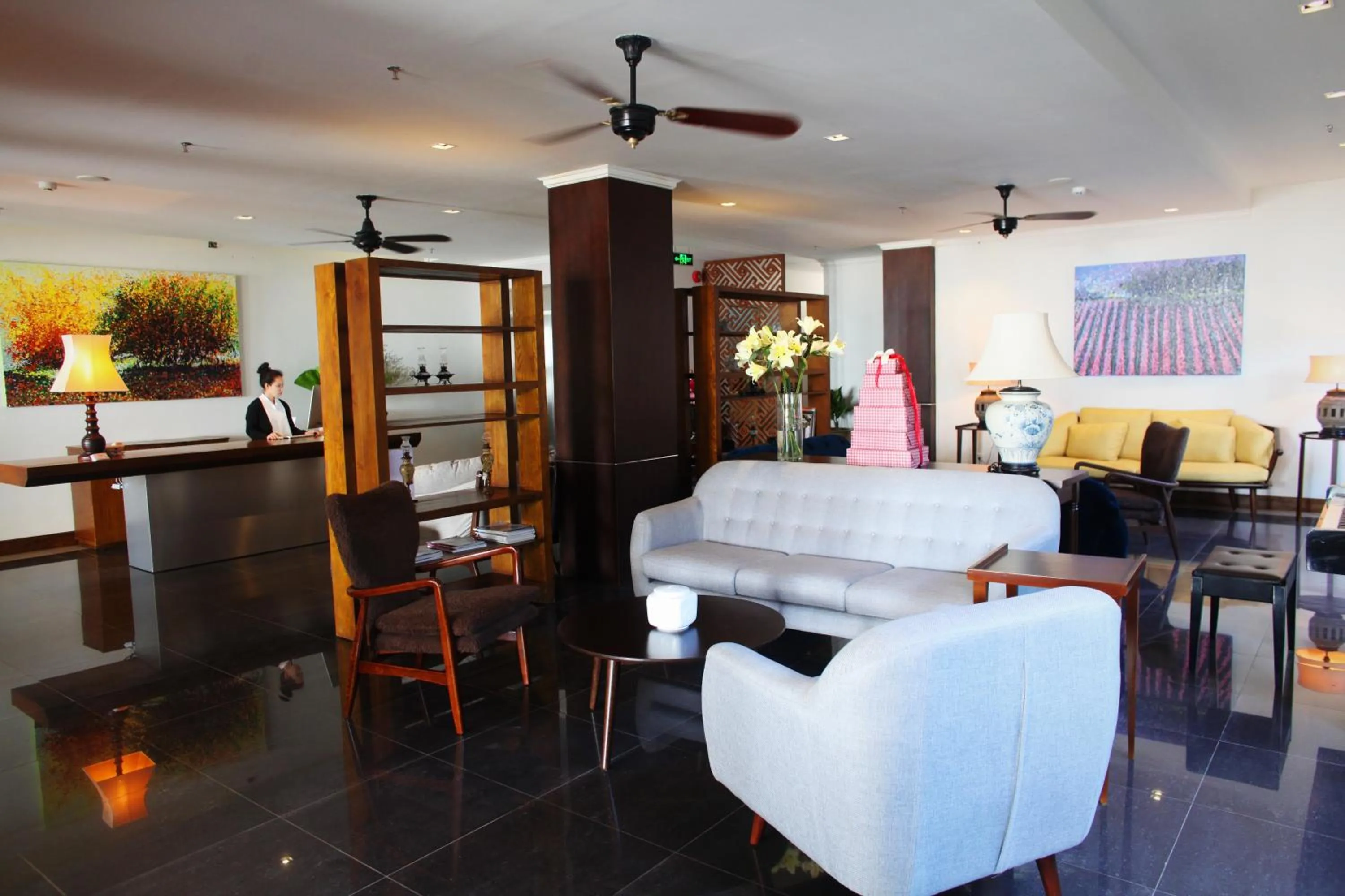 Communal lounge/ TV room in Dan Oasis Hotel and Apartment