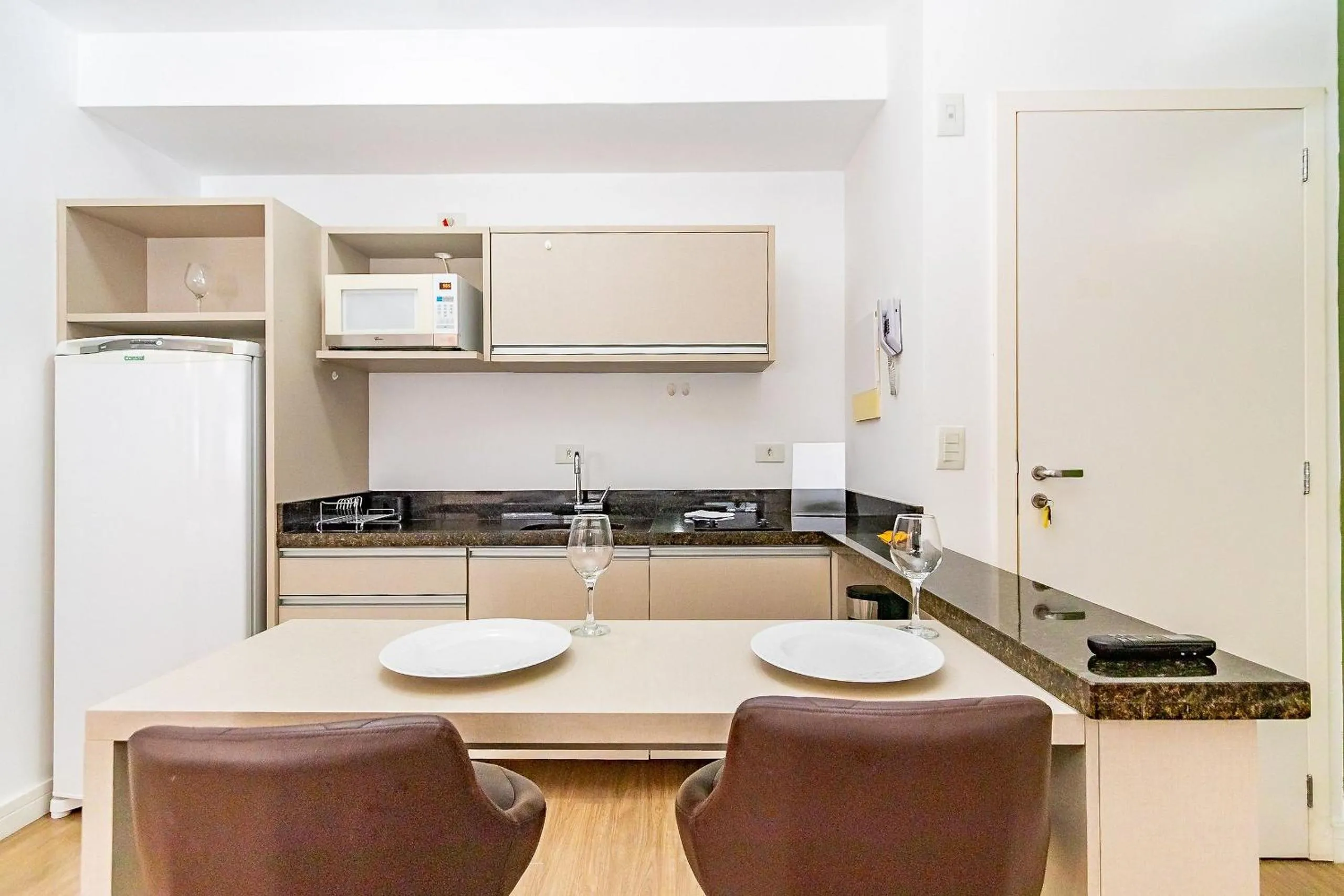 Kitchen or kitchenette in Apto em frente ao shopping com piscina aquecida