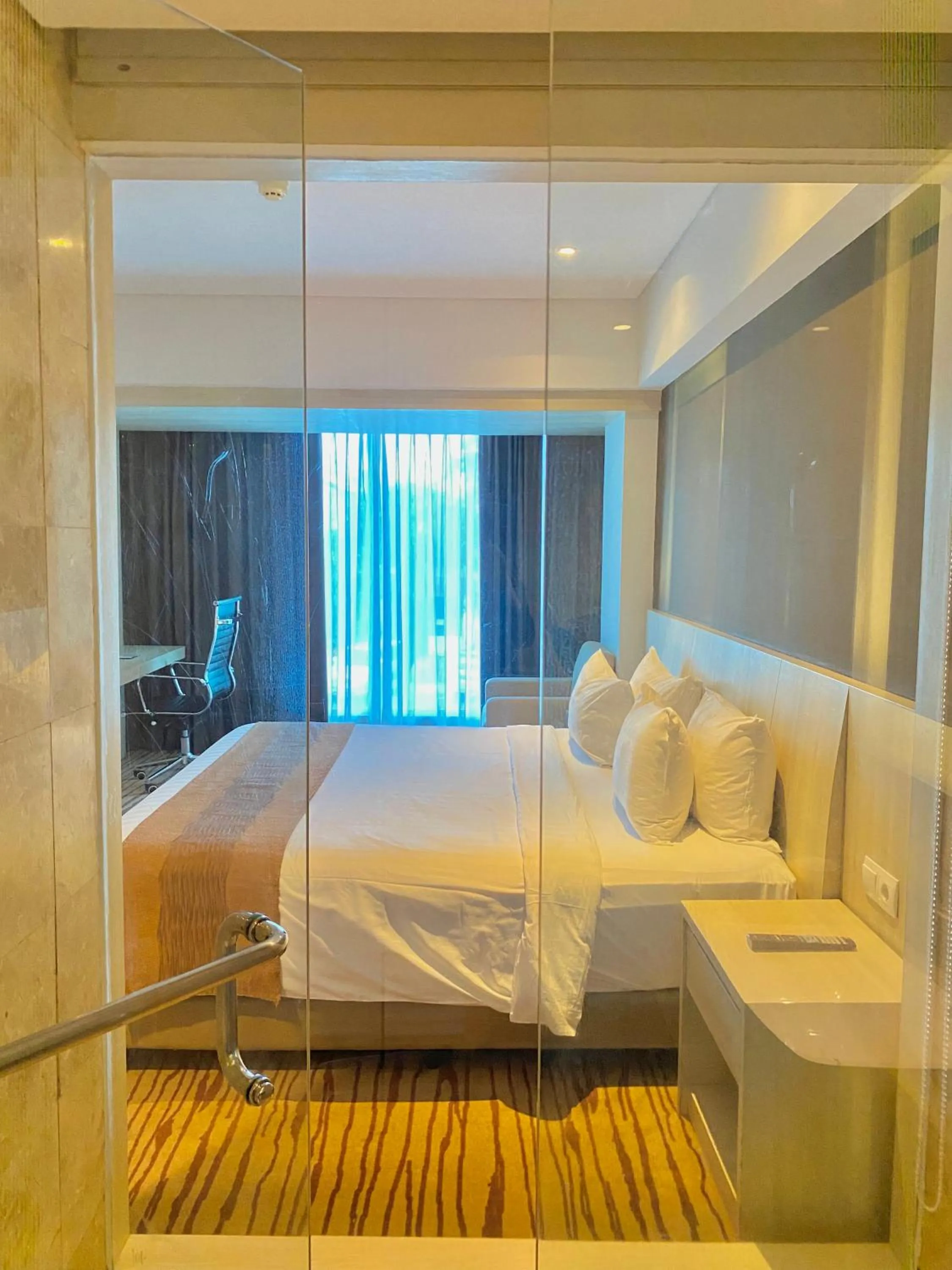 Photo of the whole room, Bed in Sovereign Bali Hotel