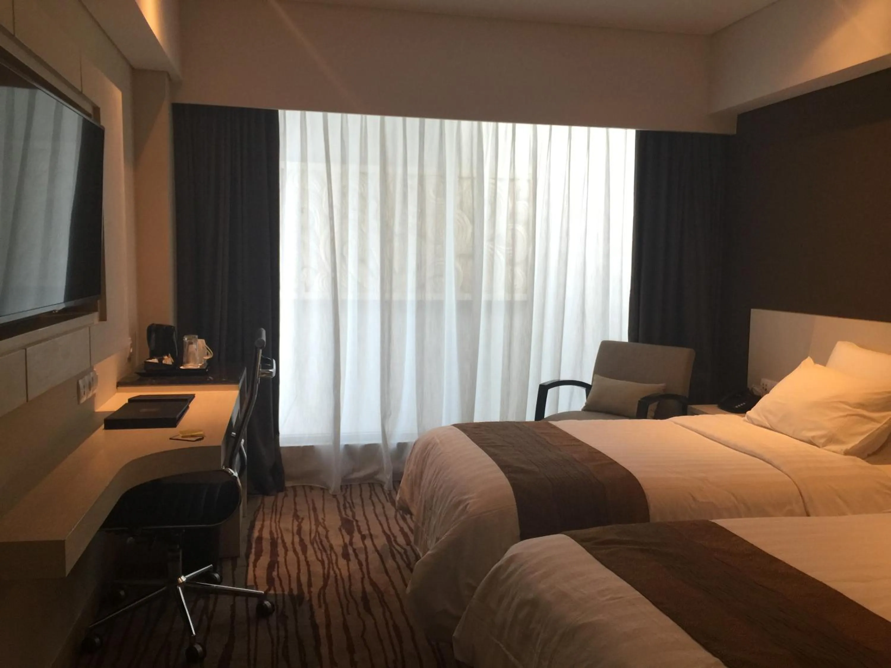 Photo of the whole room, Bed in Sovereign Bali Hotel