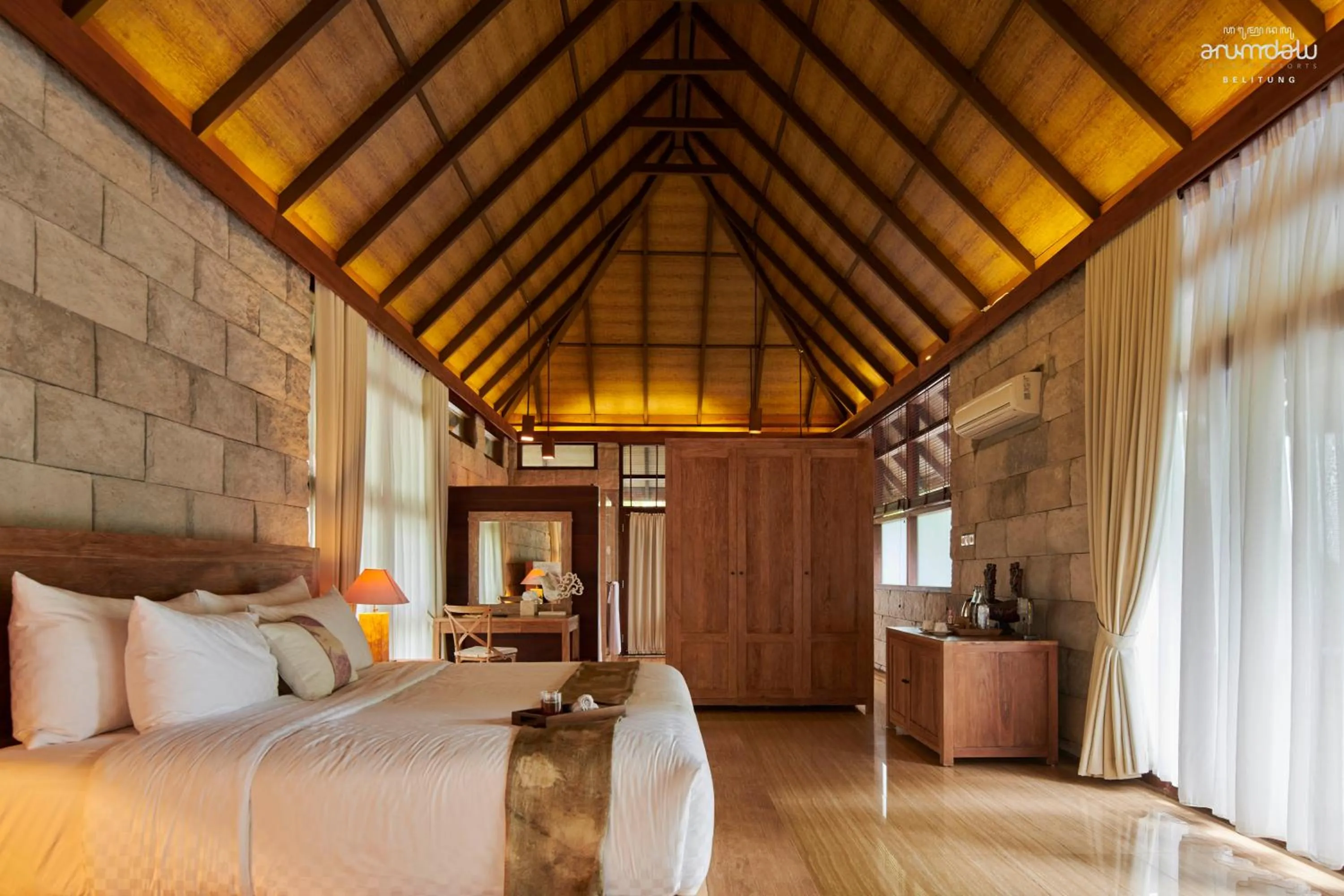 Bed in Arumdalu Private Resort