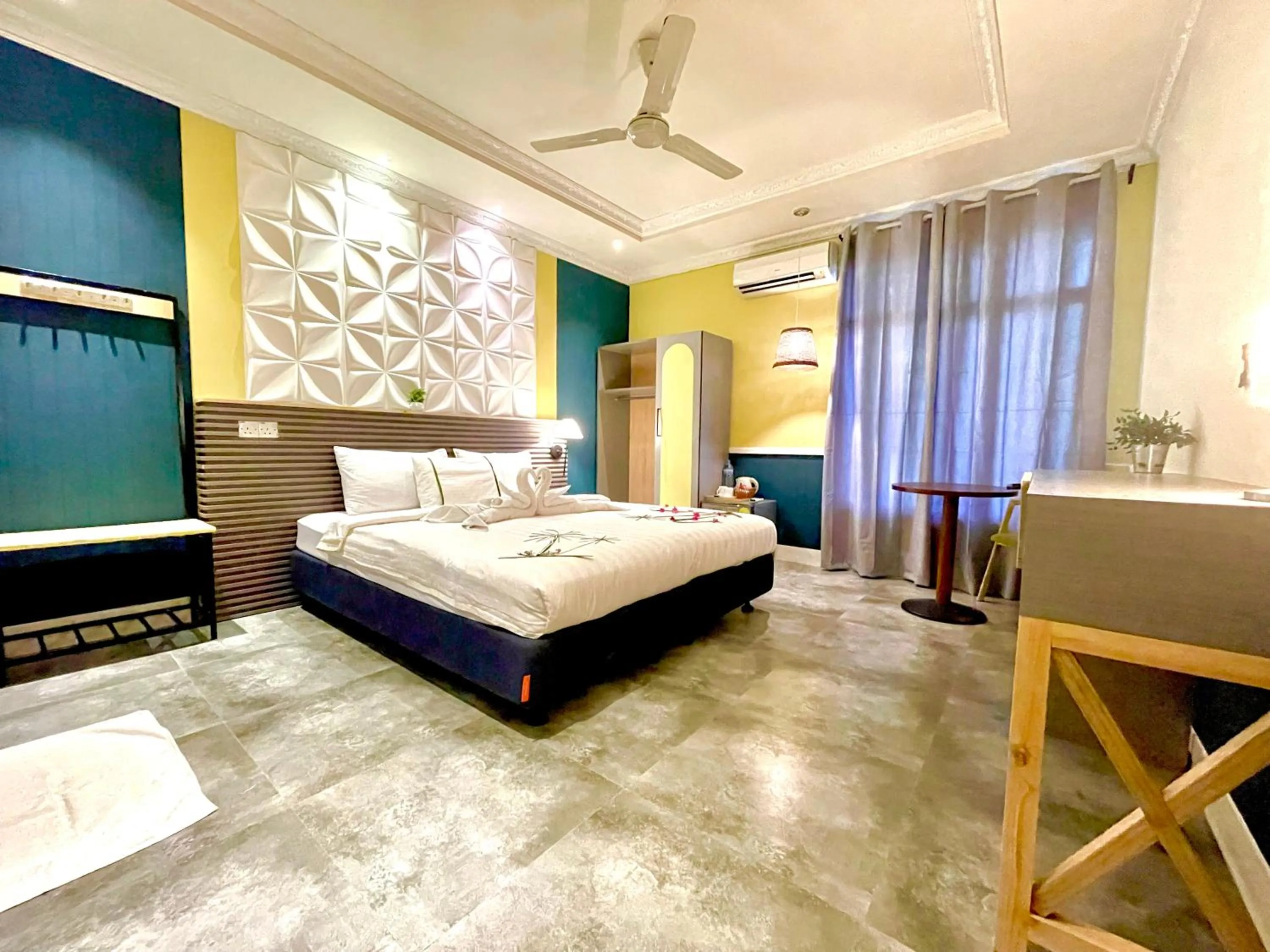 Bed in Koimala Hotel