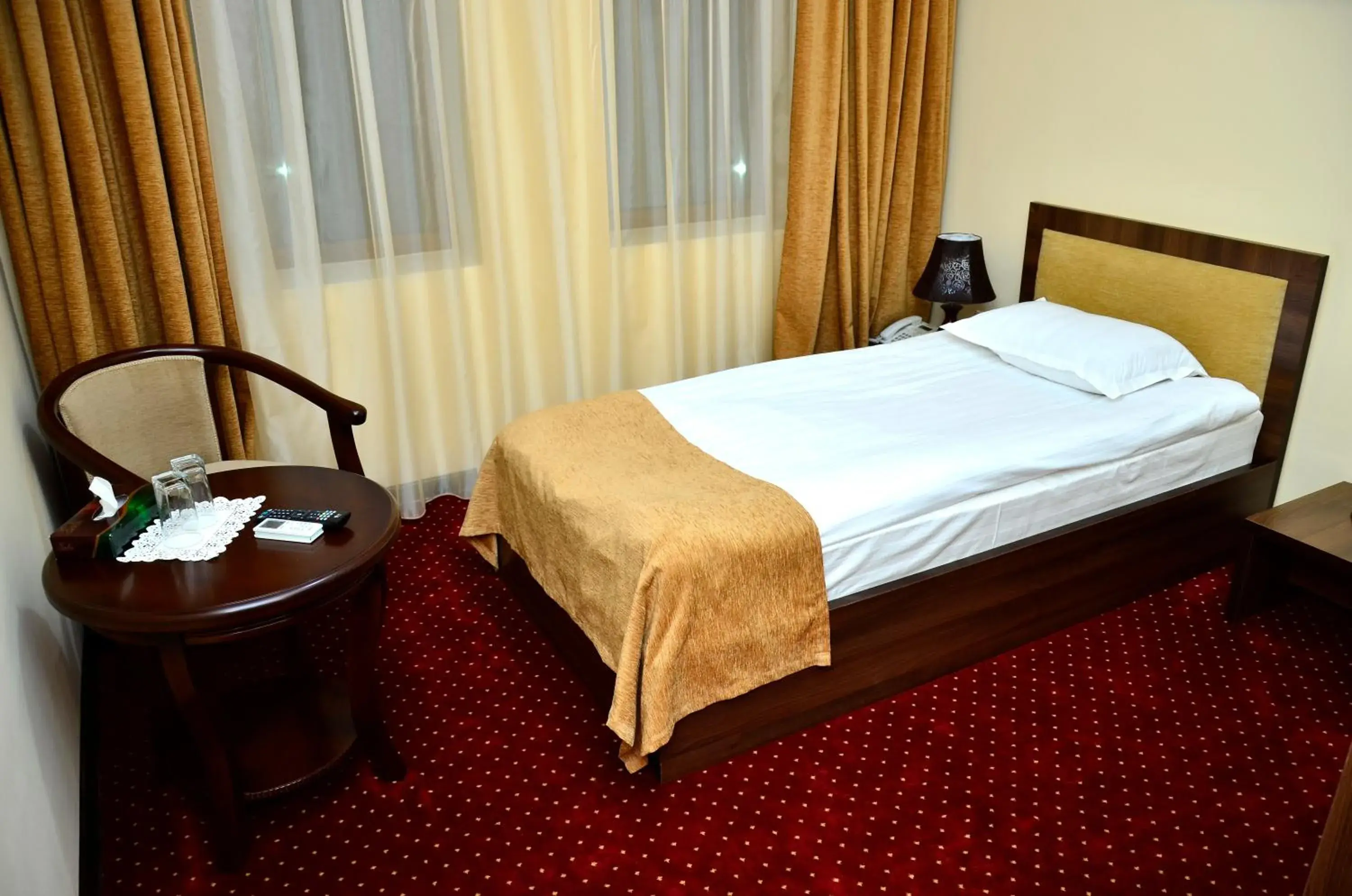 Bed in Hotel Diyora Bed in Hotel Diyora