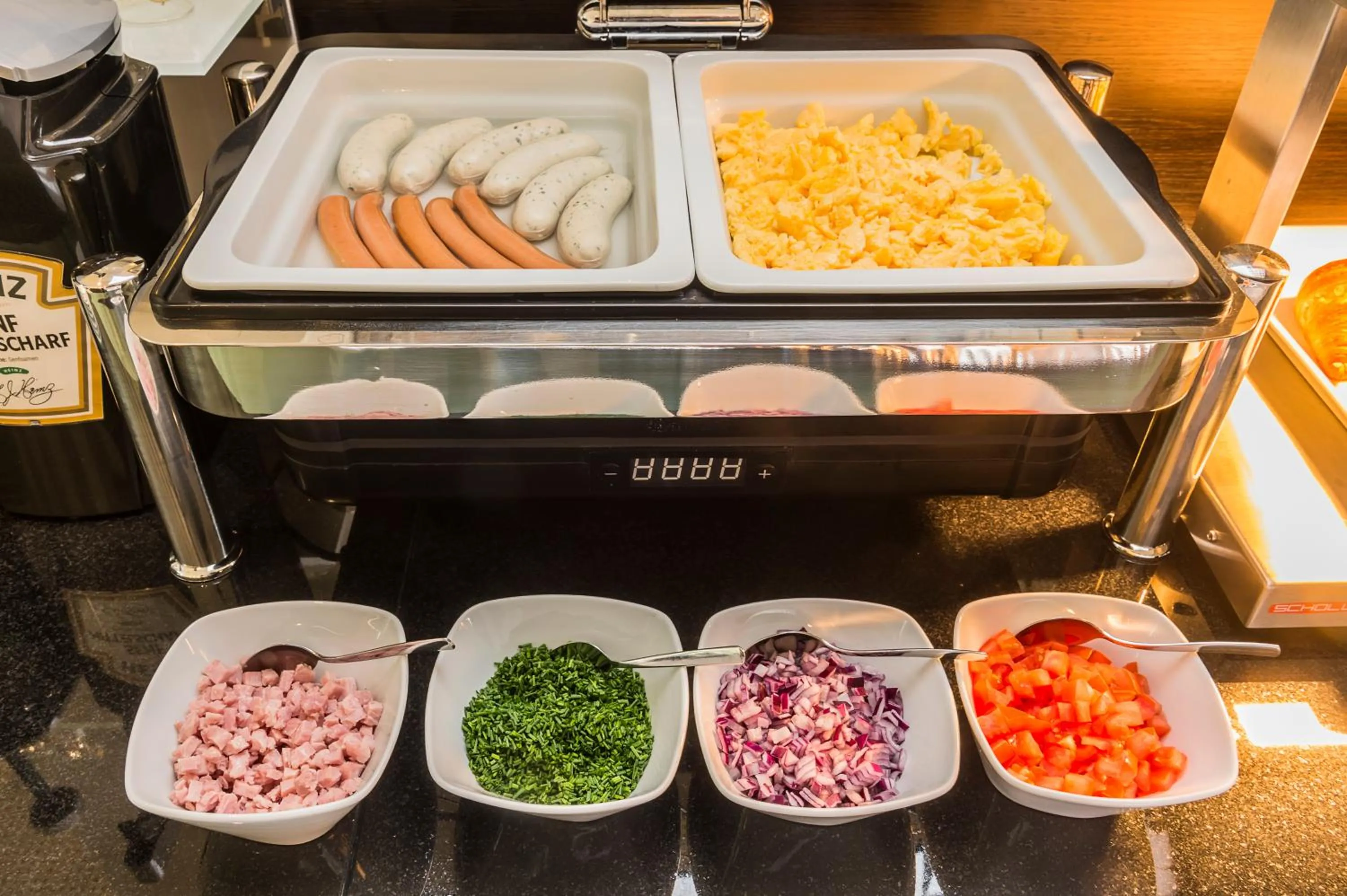 Buffet breakfast in Star G Hotel Premium München Domagkstraße