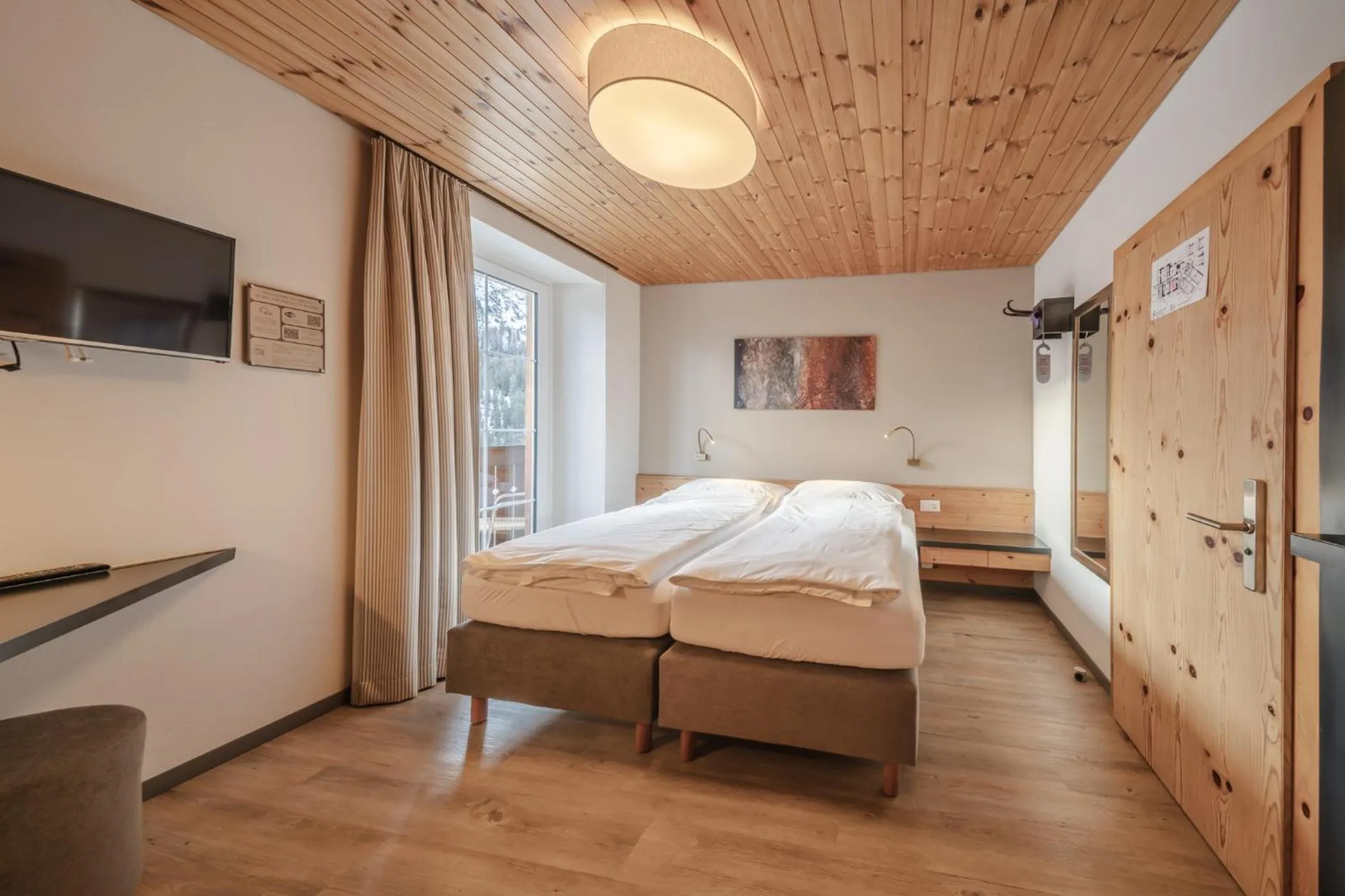 Photo of the whole room, Bed in Hotel Quellenhof - Self Check-in & Adults Only