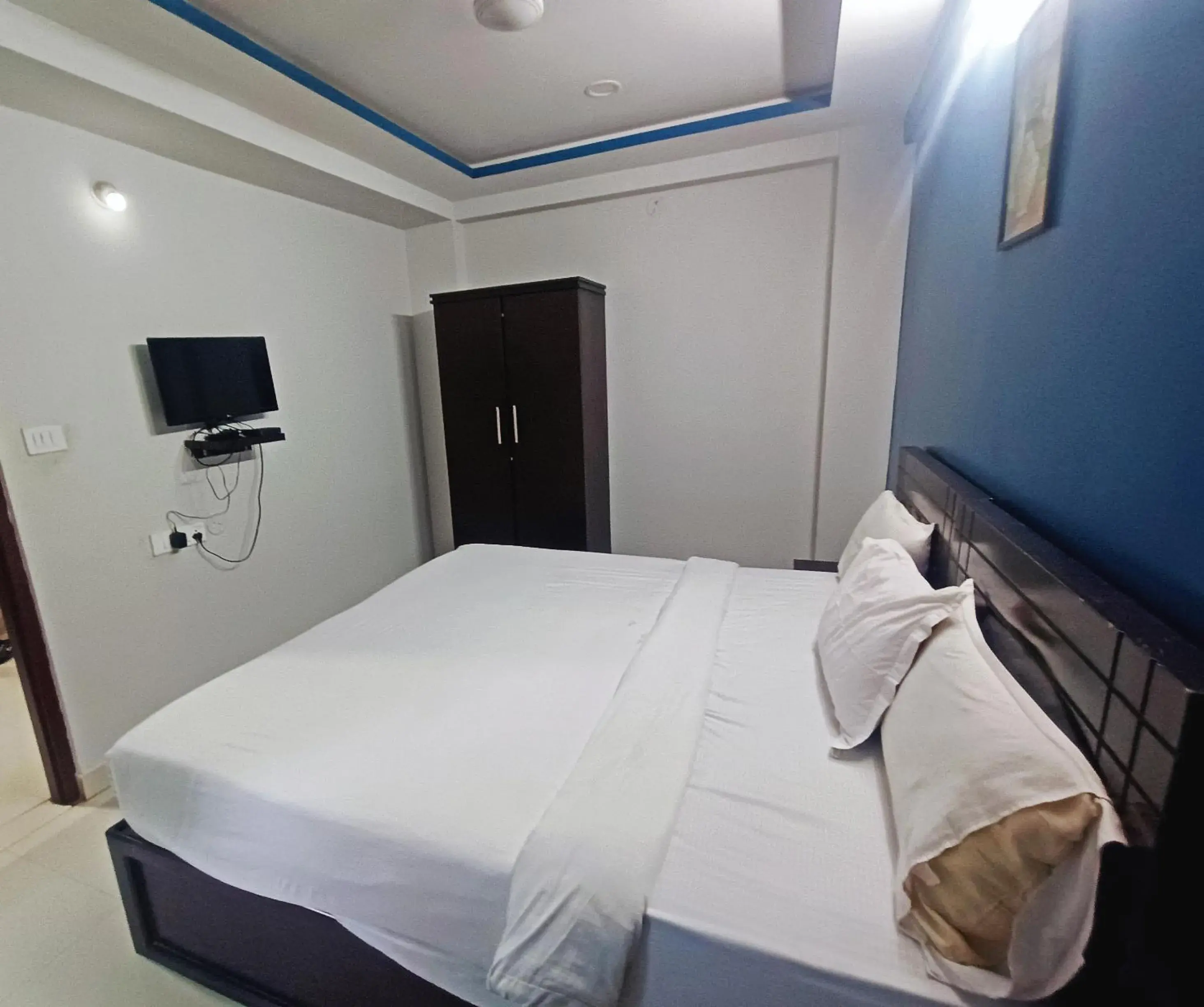 Bedroom in Delta Inn Madiwala Bedroom in Delta Inn Madiwala