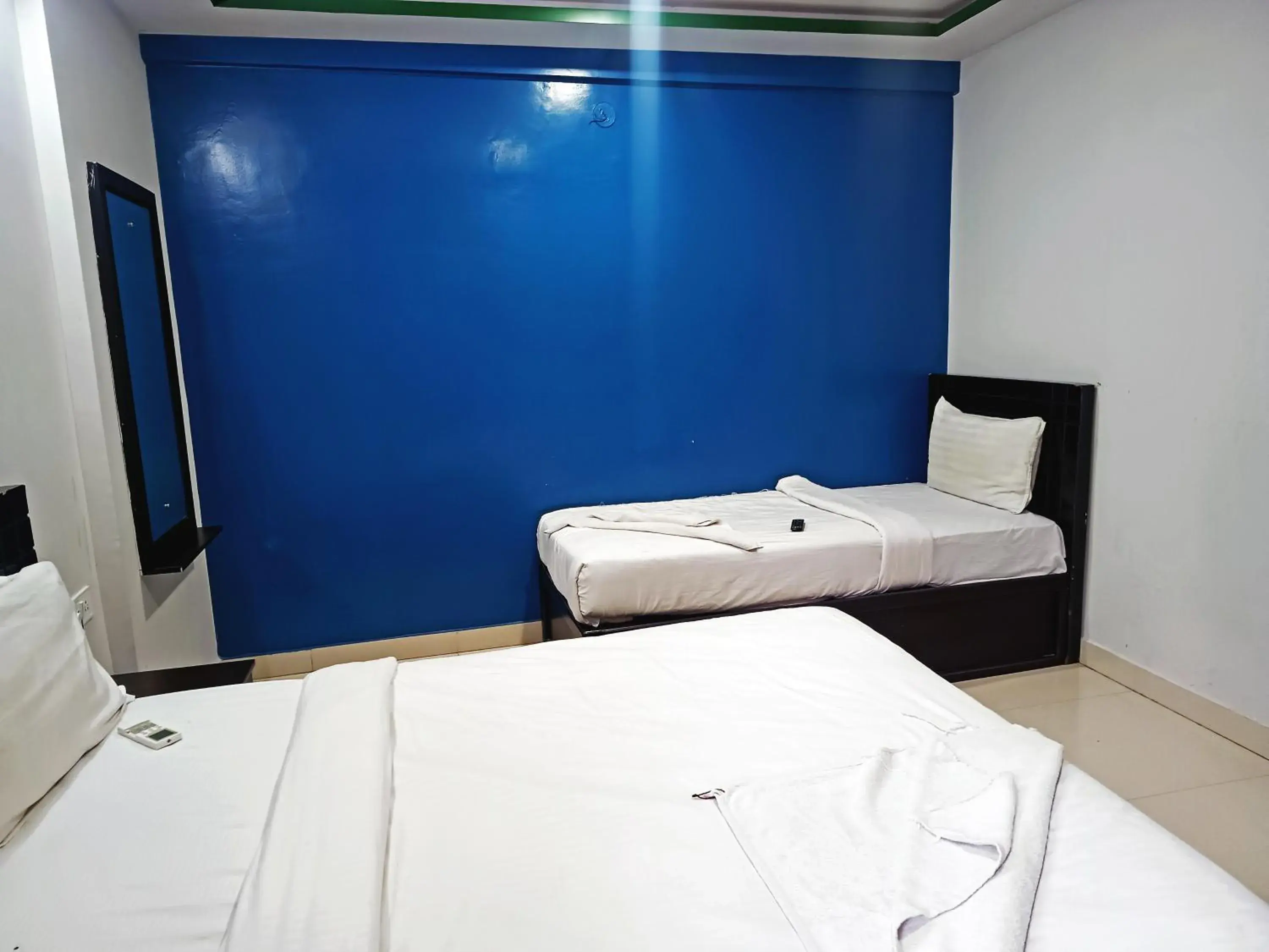 Bedroom in Delta Inn Madiwala Bedroom in Delta Inn Madiwala