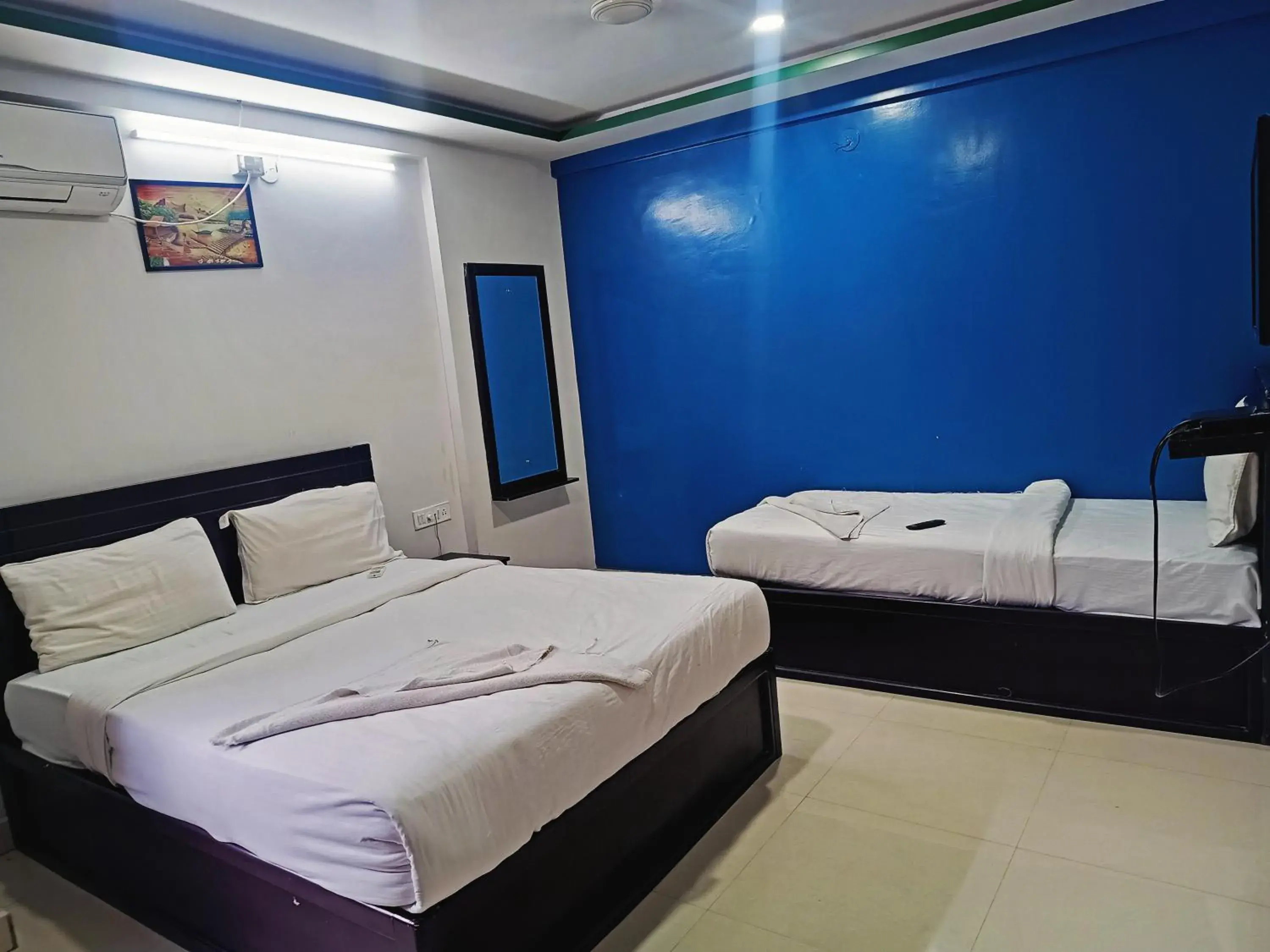 Bedroom in Delta Inn Madiwala Bedroom in Delta Inn Madiwala