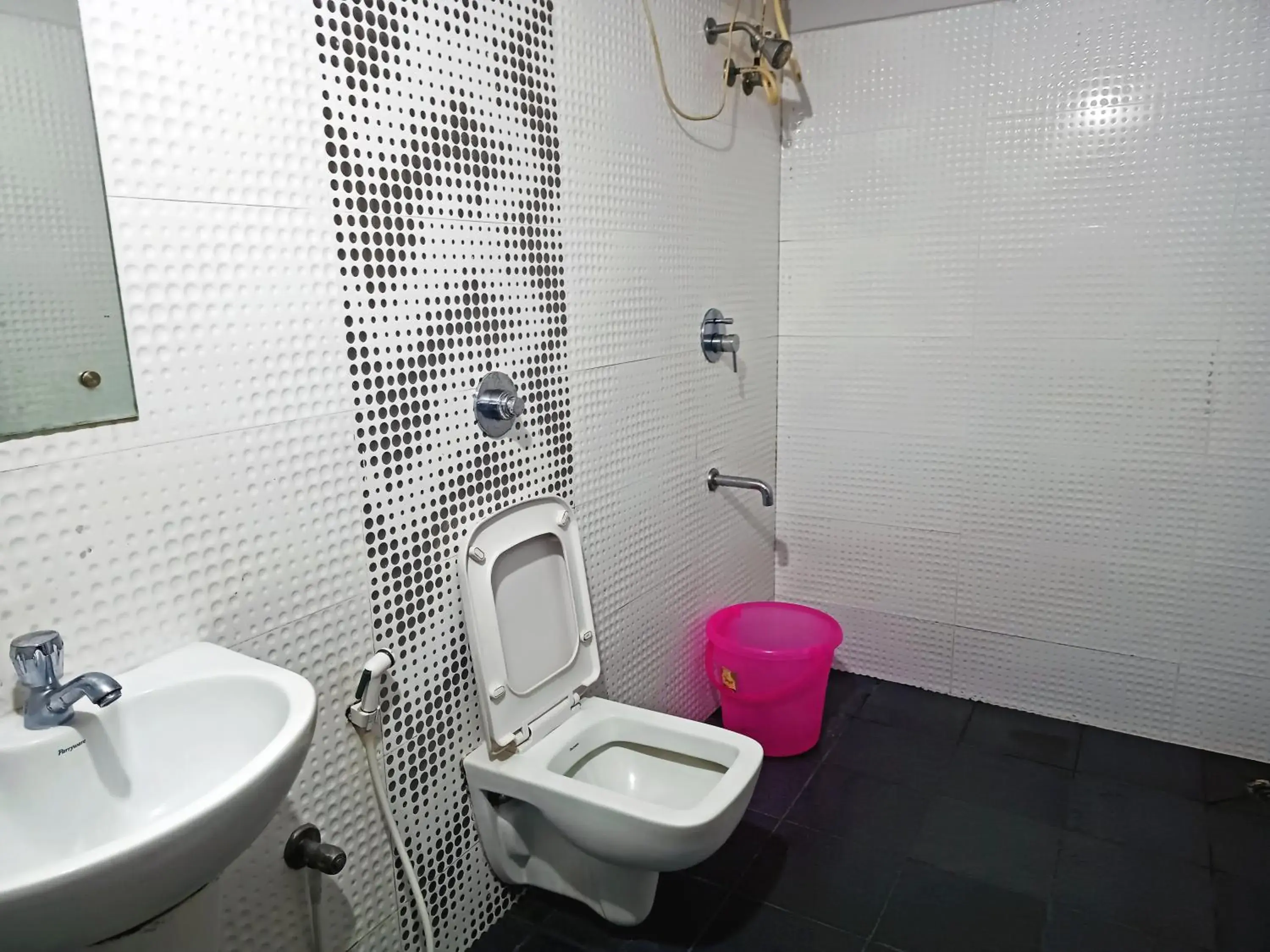 Bathroom in Delta Inn Madiwala Bathroom in Delta Inn Madiwala