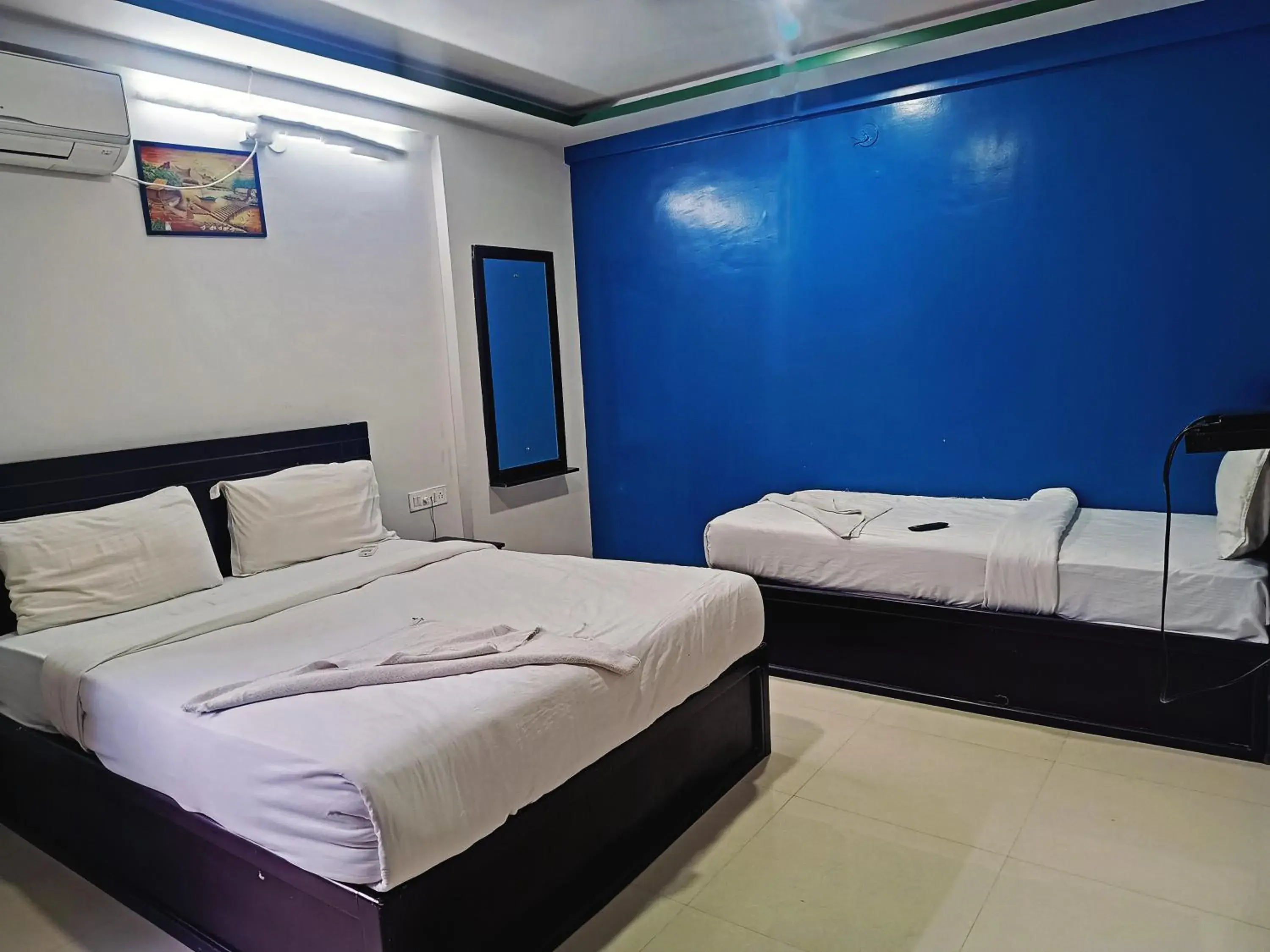 Bedroom in Delta Inn Madiwala Bedroom in Delta Inn Madiwala