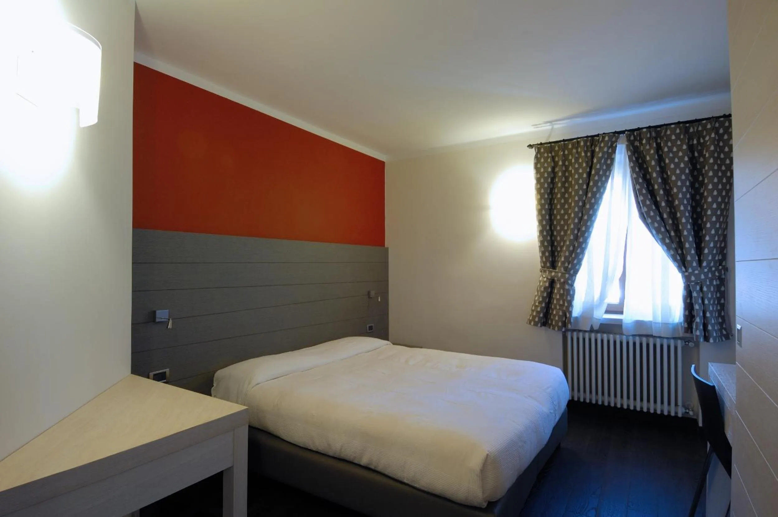 Bed in Hotel Bucaneve