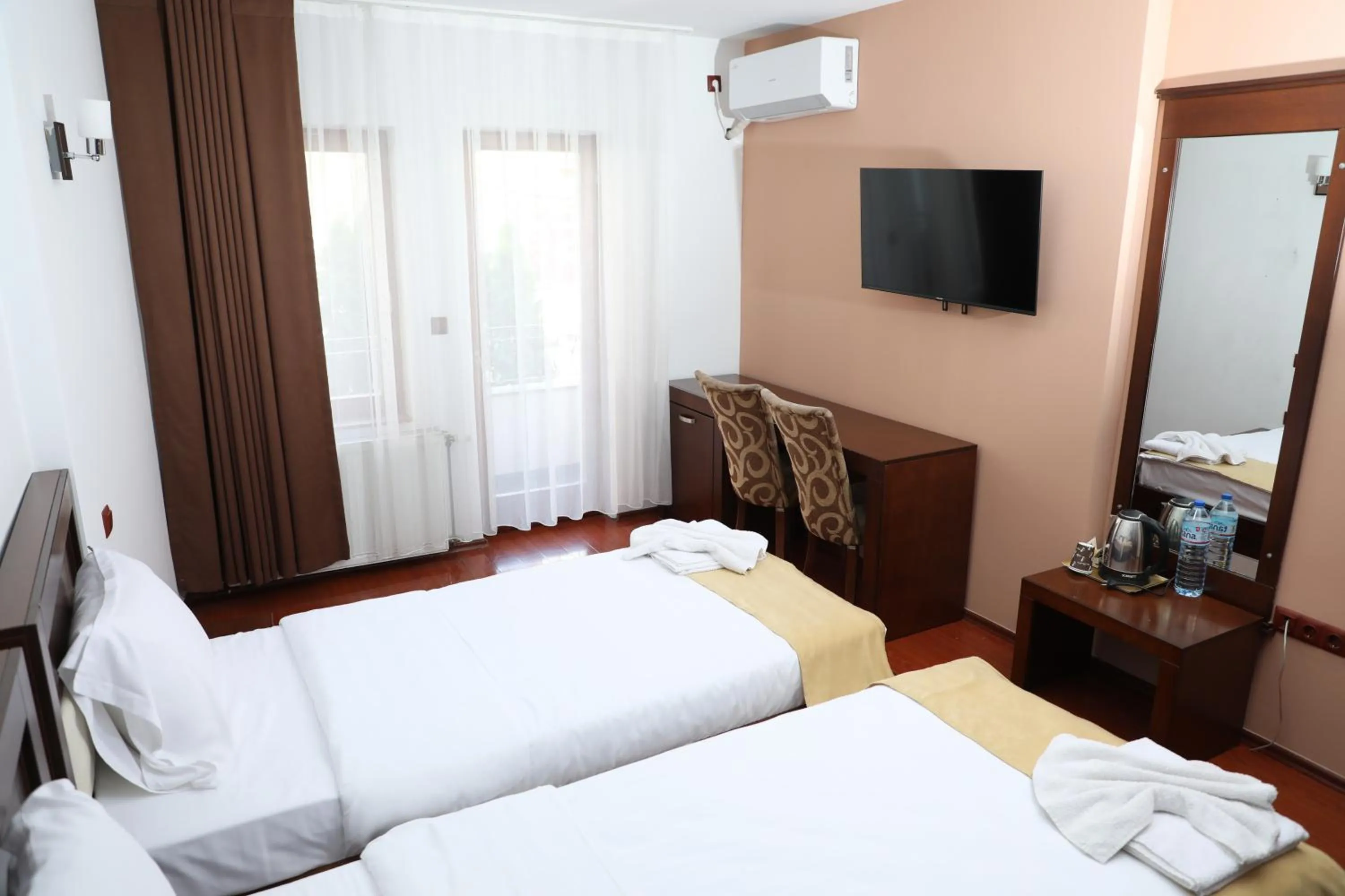 Bed in Bruti Hotel