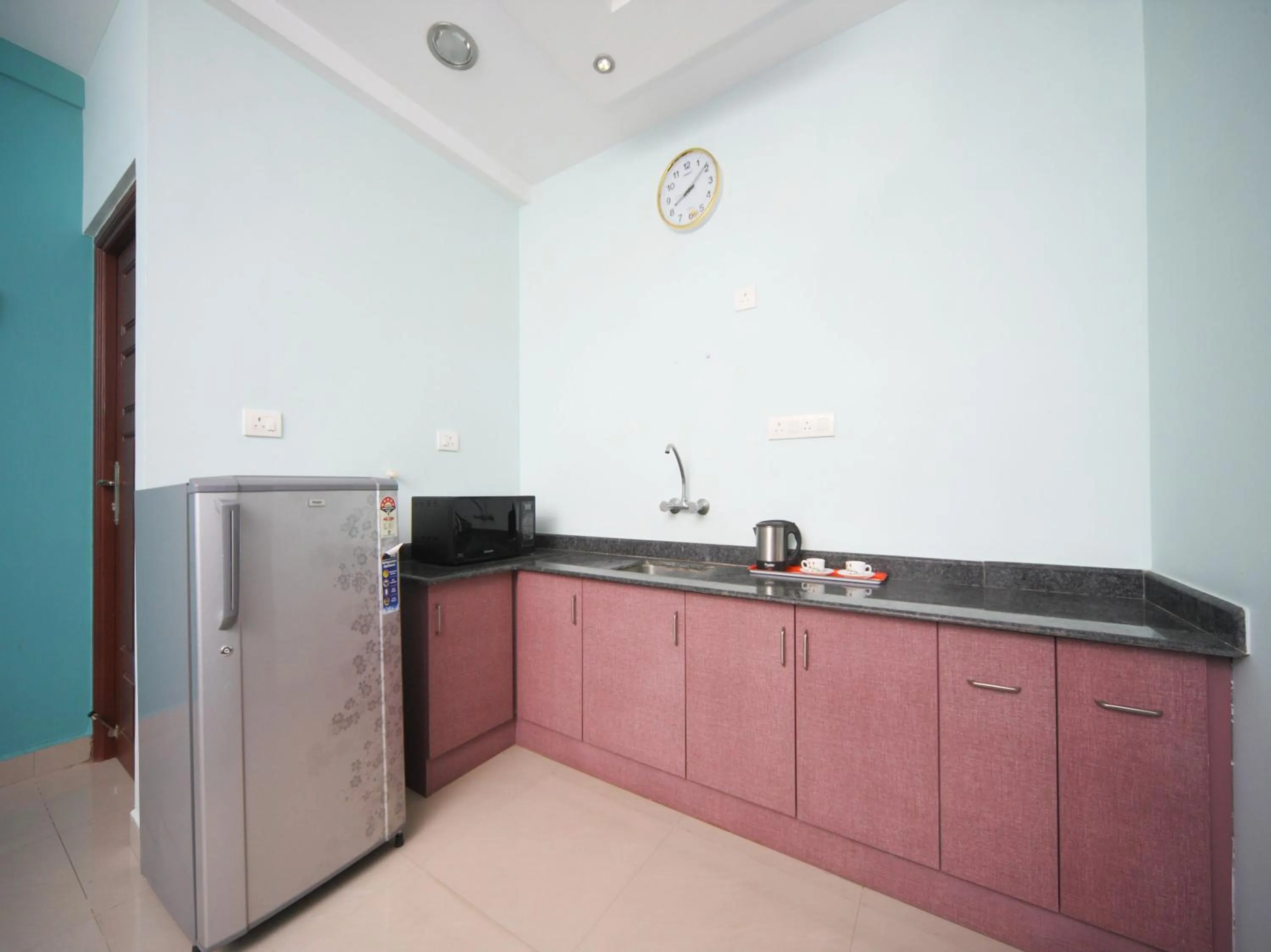 Kitchen or kitchenette in Max Classic Serviced Apartment