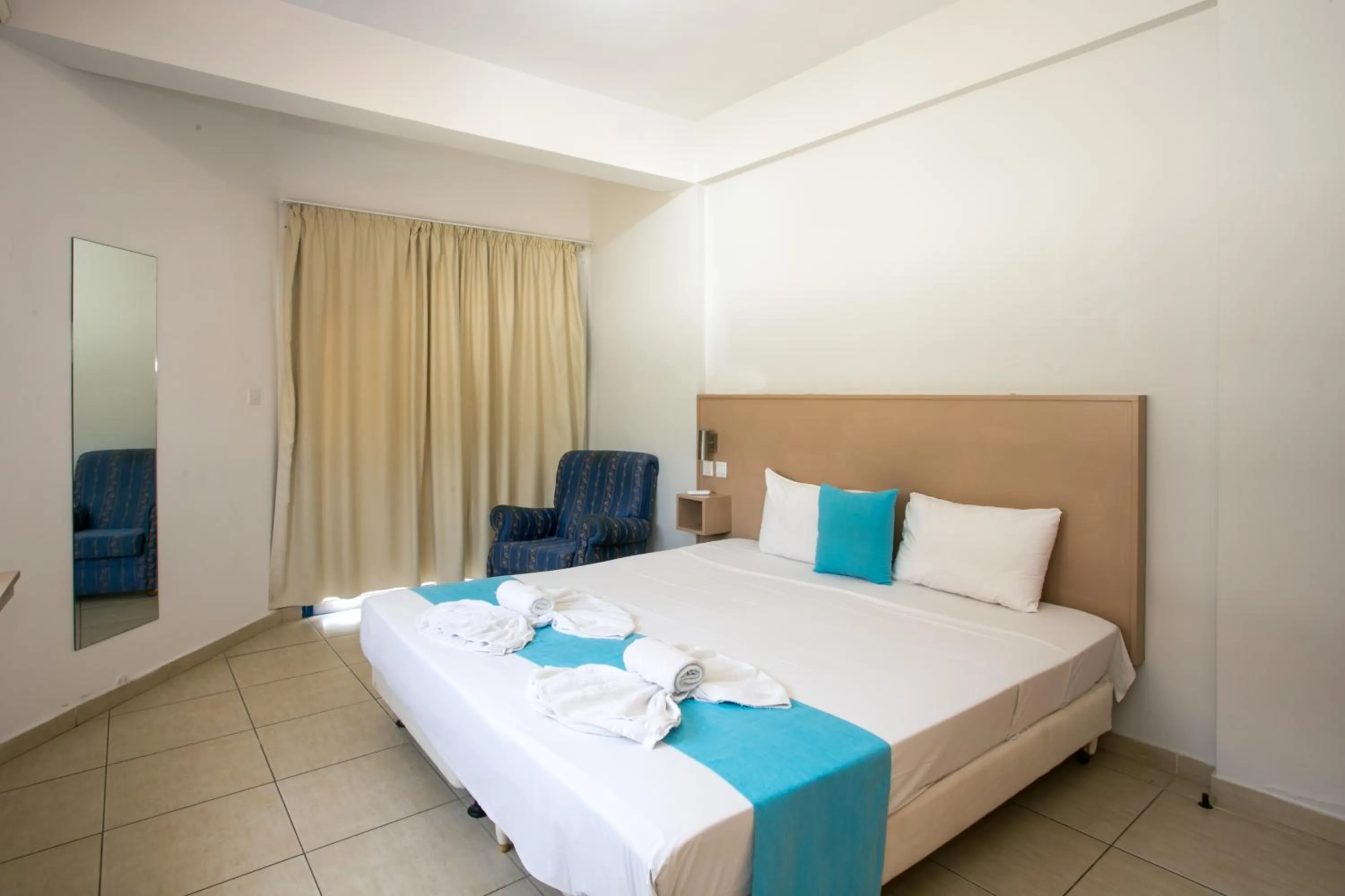 Photo of the whole room, Bed in Sea CleoNapa Hotel