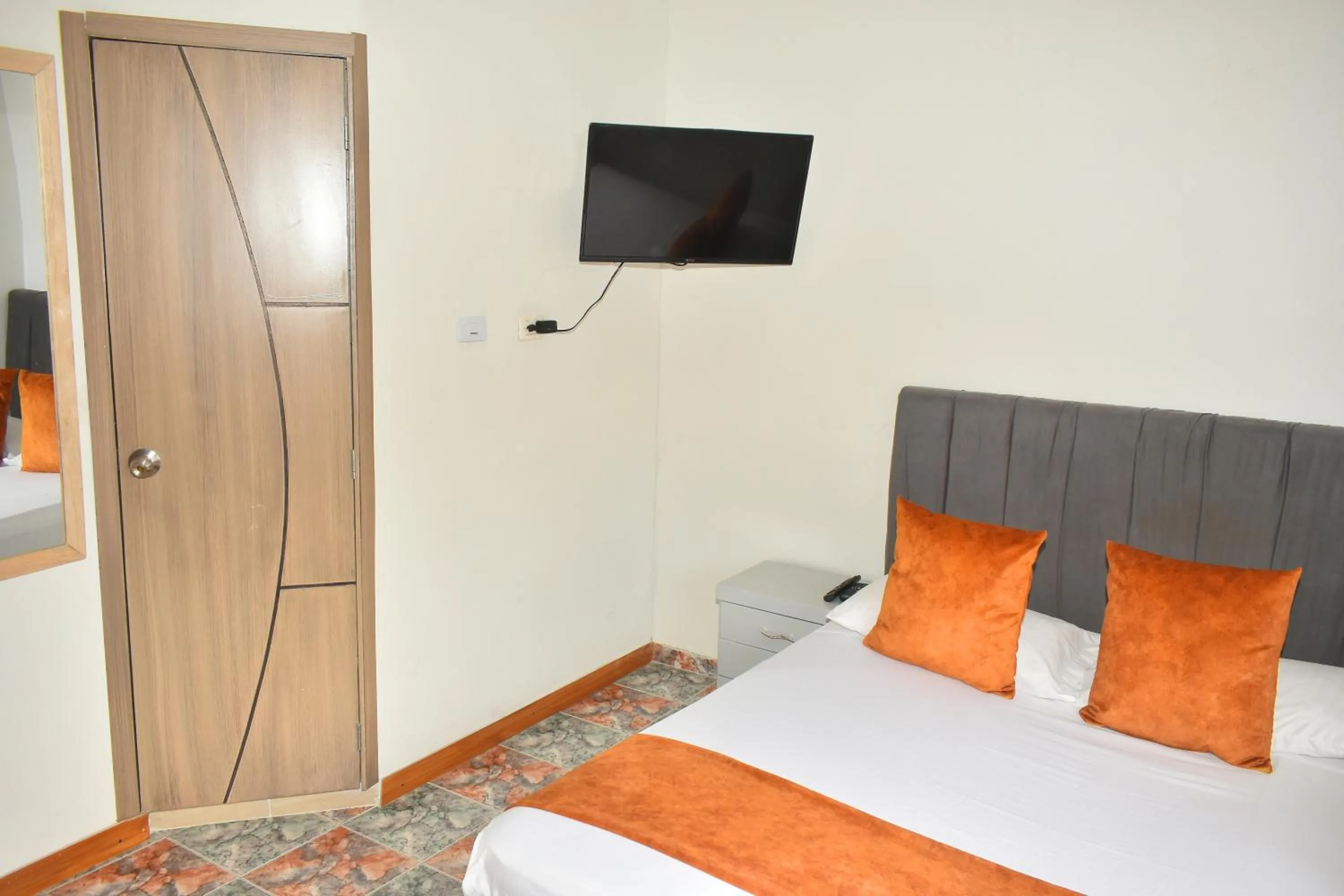 Communal lounge/ TV room, Bed in Hotel Flamante Bulevar