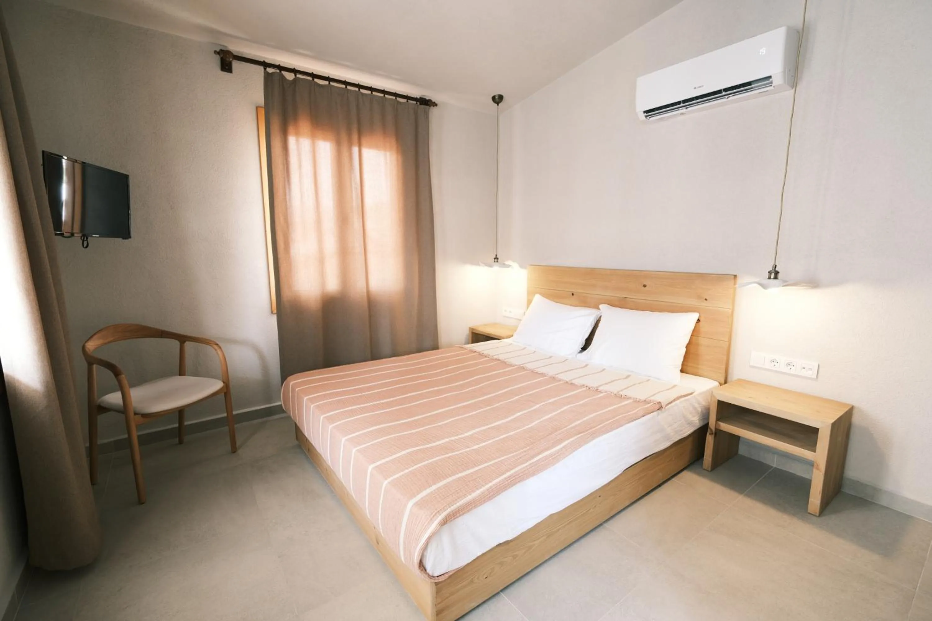 Communal lounge/ TV room in Nephos Beach Hotel