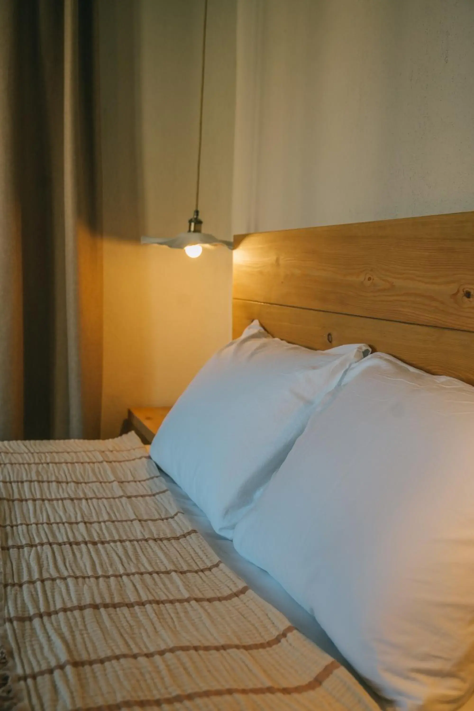 Bed in Nephos Beach Hotel Bed in Nephos Beach Hotel