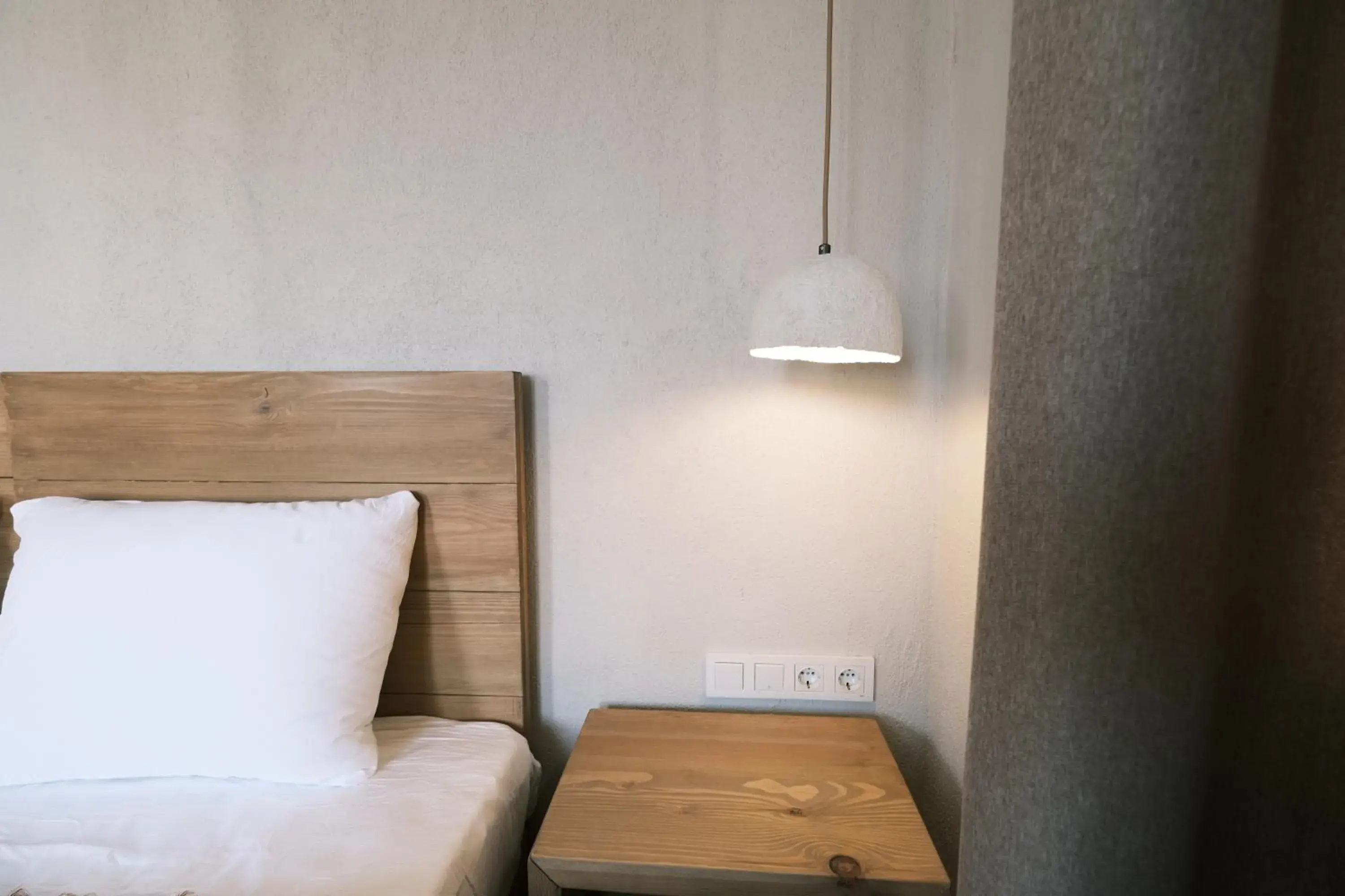 Bed in Nephos Beach Hotel Bed in Nephos Beach Hotel