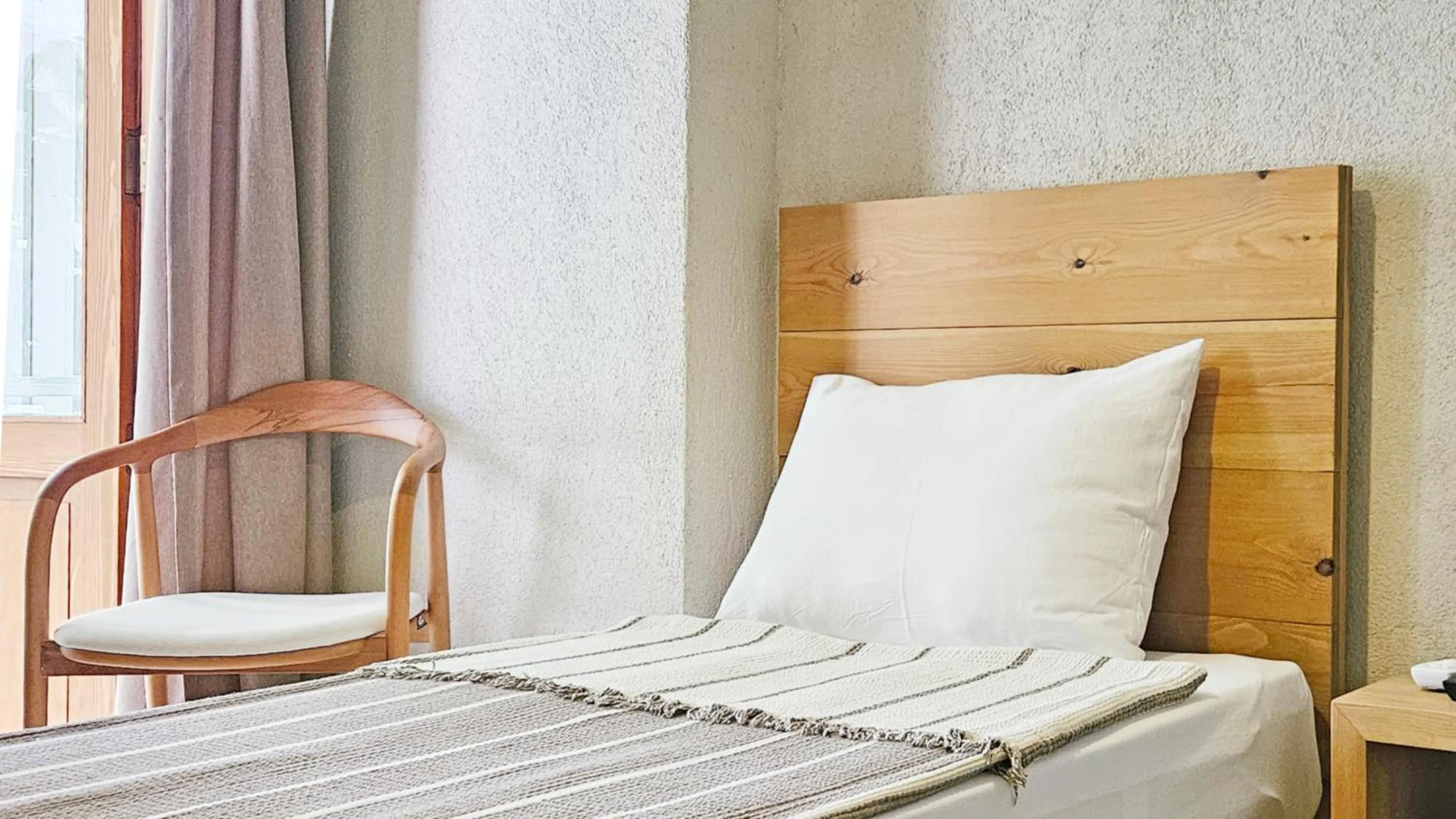 Bed in Nephos Beach Hotel