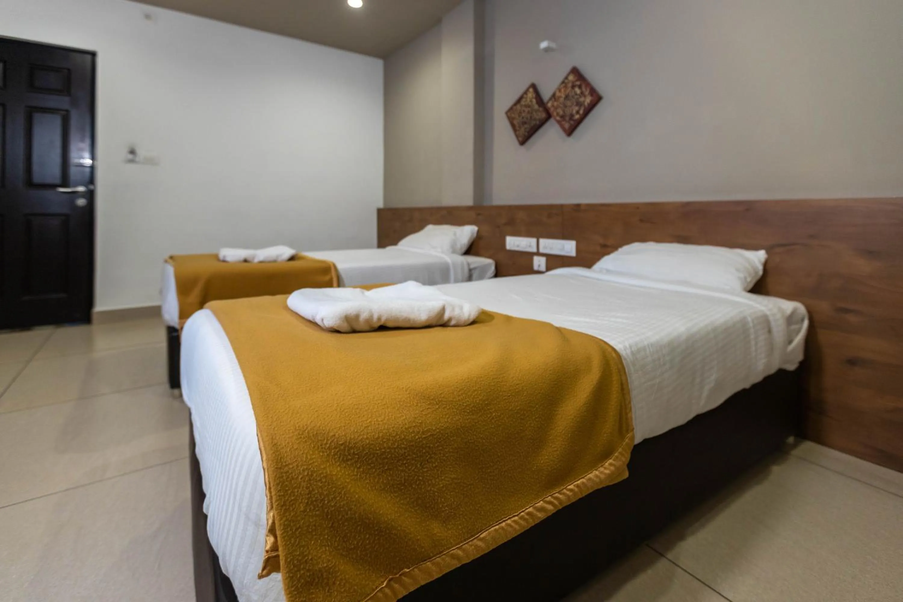 Bed in Aryaas Residency Nettoor