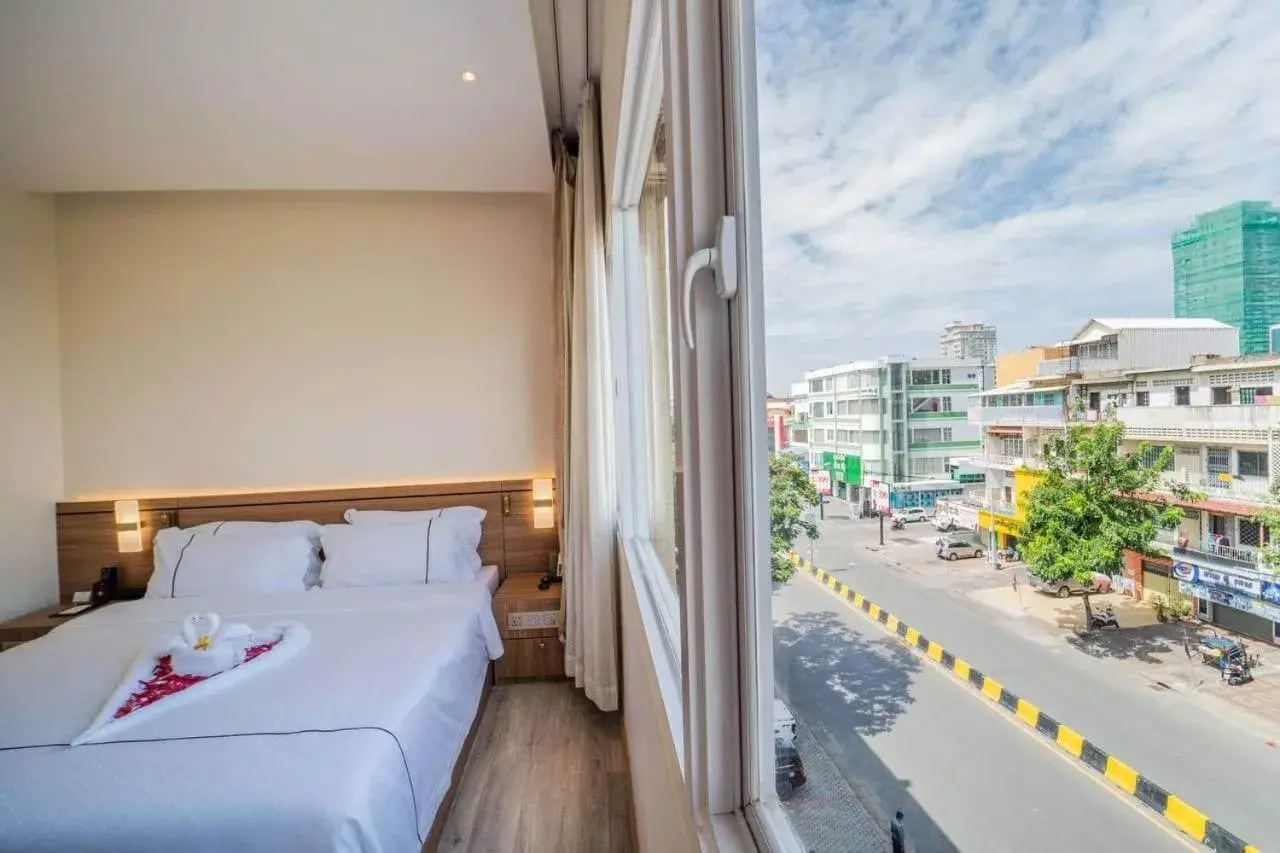 City view, Bed in Le President Hotel City view, Bed in Le President Hotel