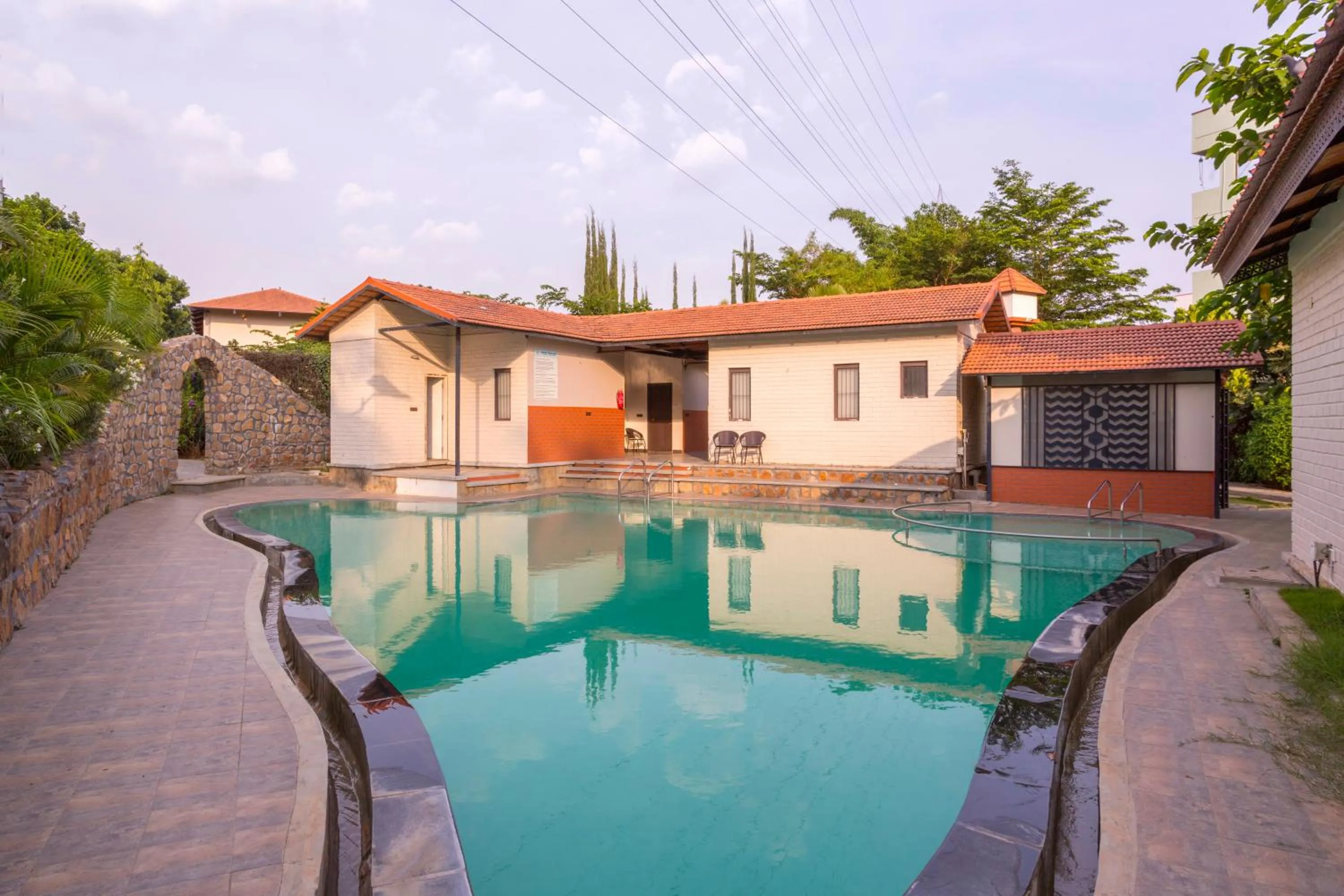 Swimming pool in Nirantara Resort & Spa