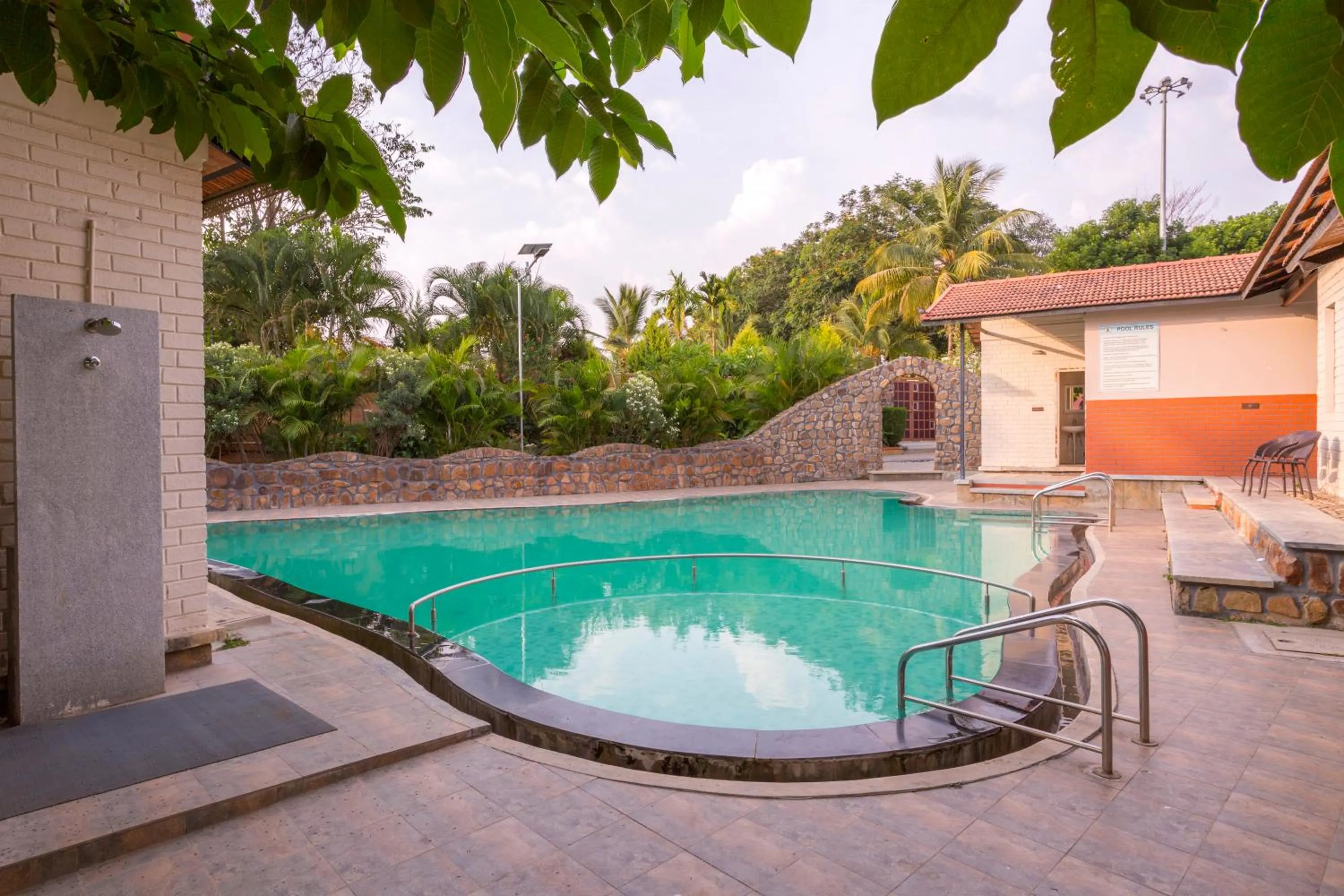 Swimming pool in Nirantara Resort & Spa