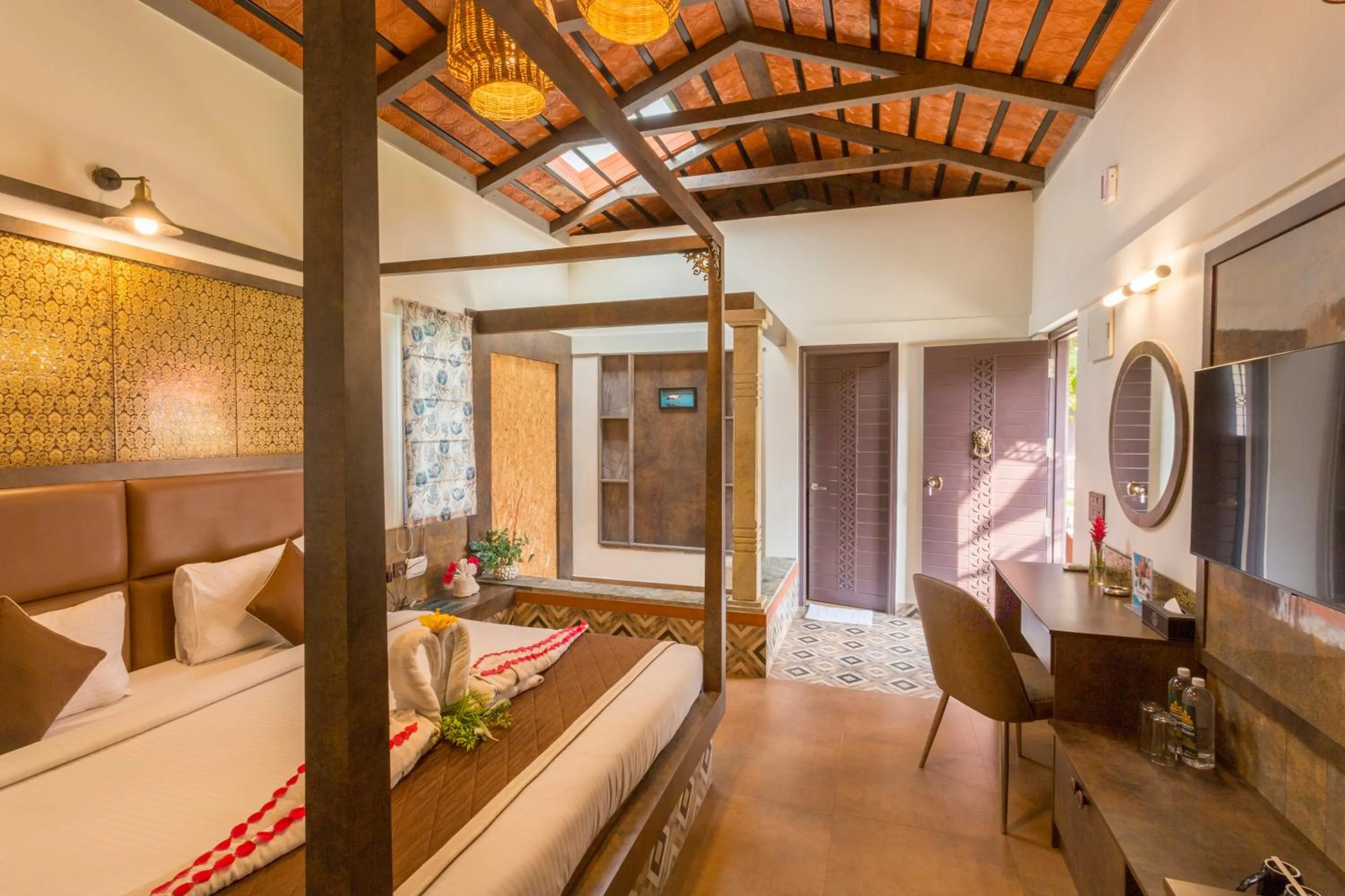 Bed in Nirantara Resort & Spa