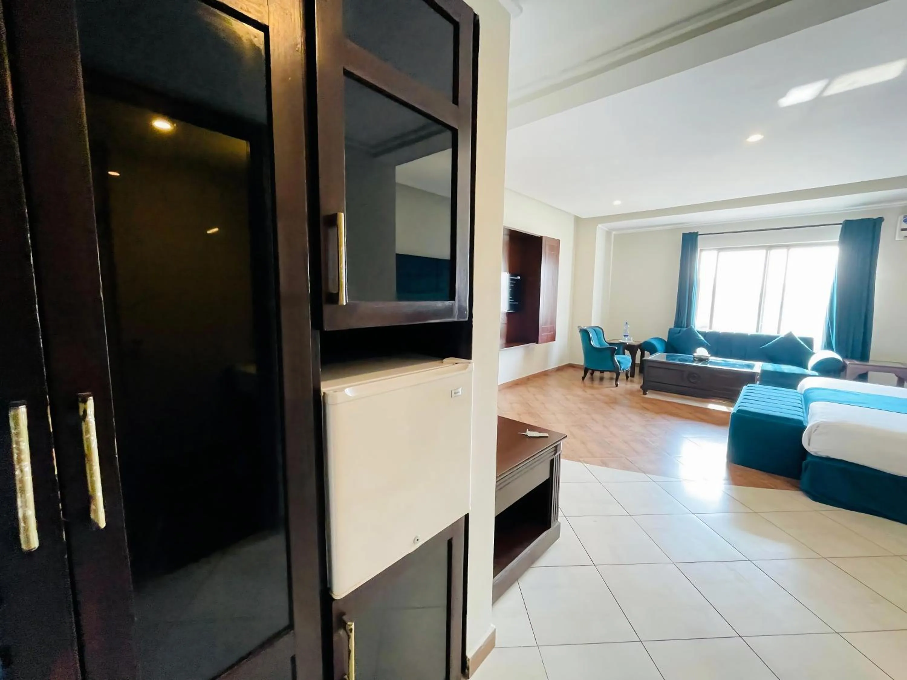 Seating area, Bed in Grand Regency