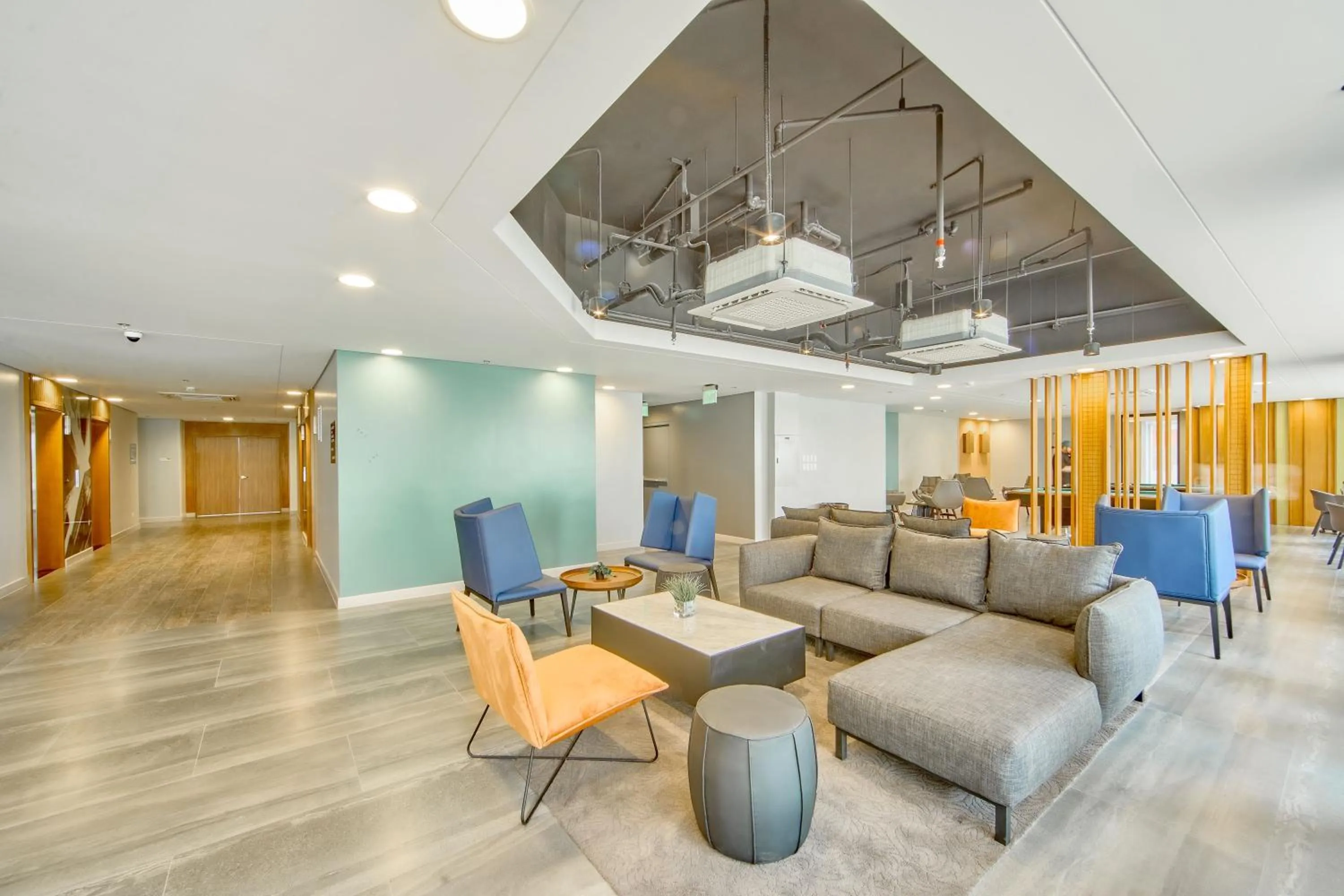 Communal lounge/ TV room in The Connor Serviced Residences Managed by HII