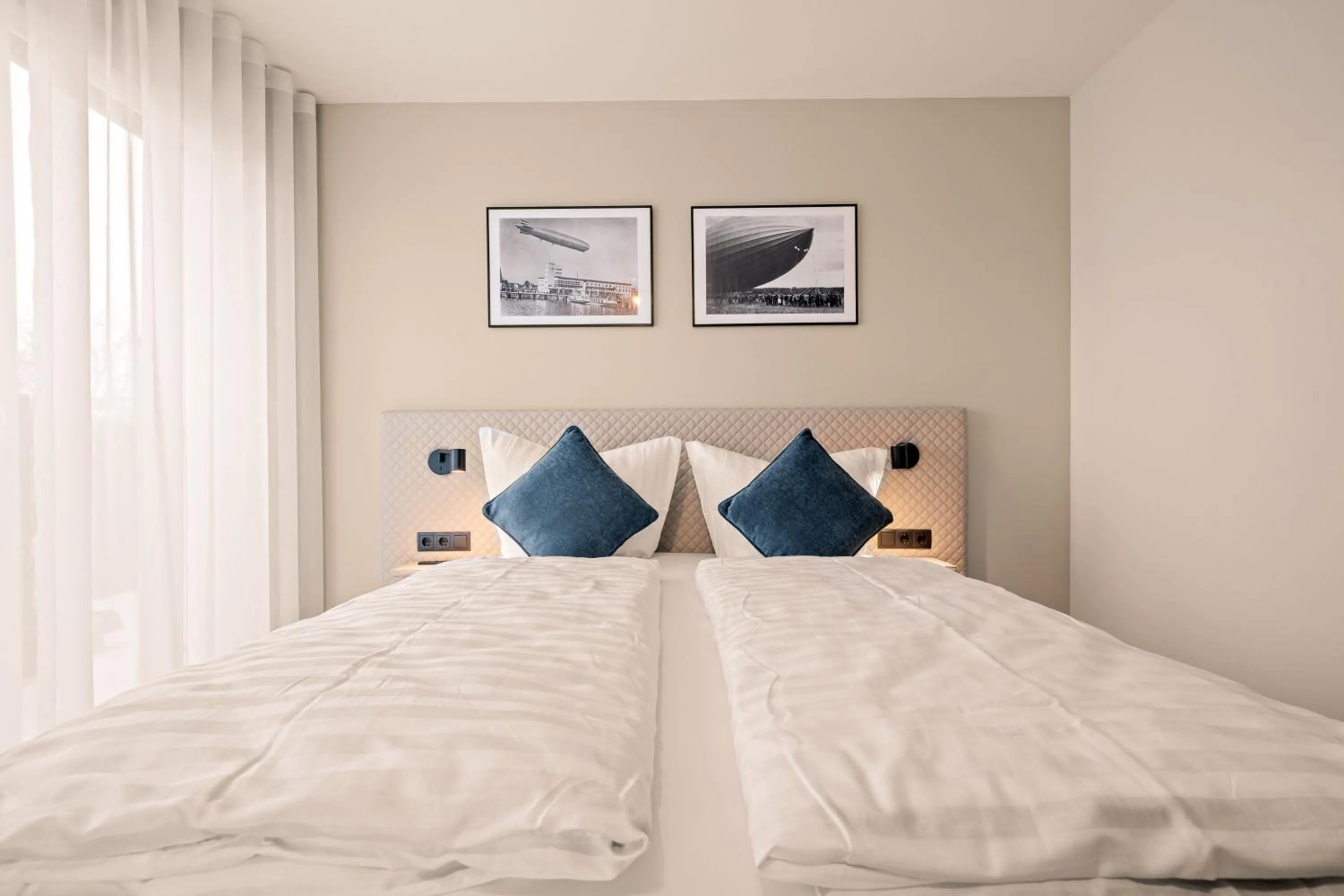 Bed in Motel42-Temporary Living
