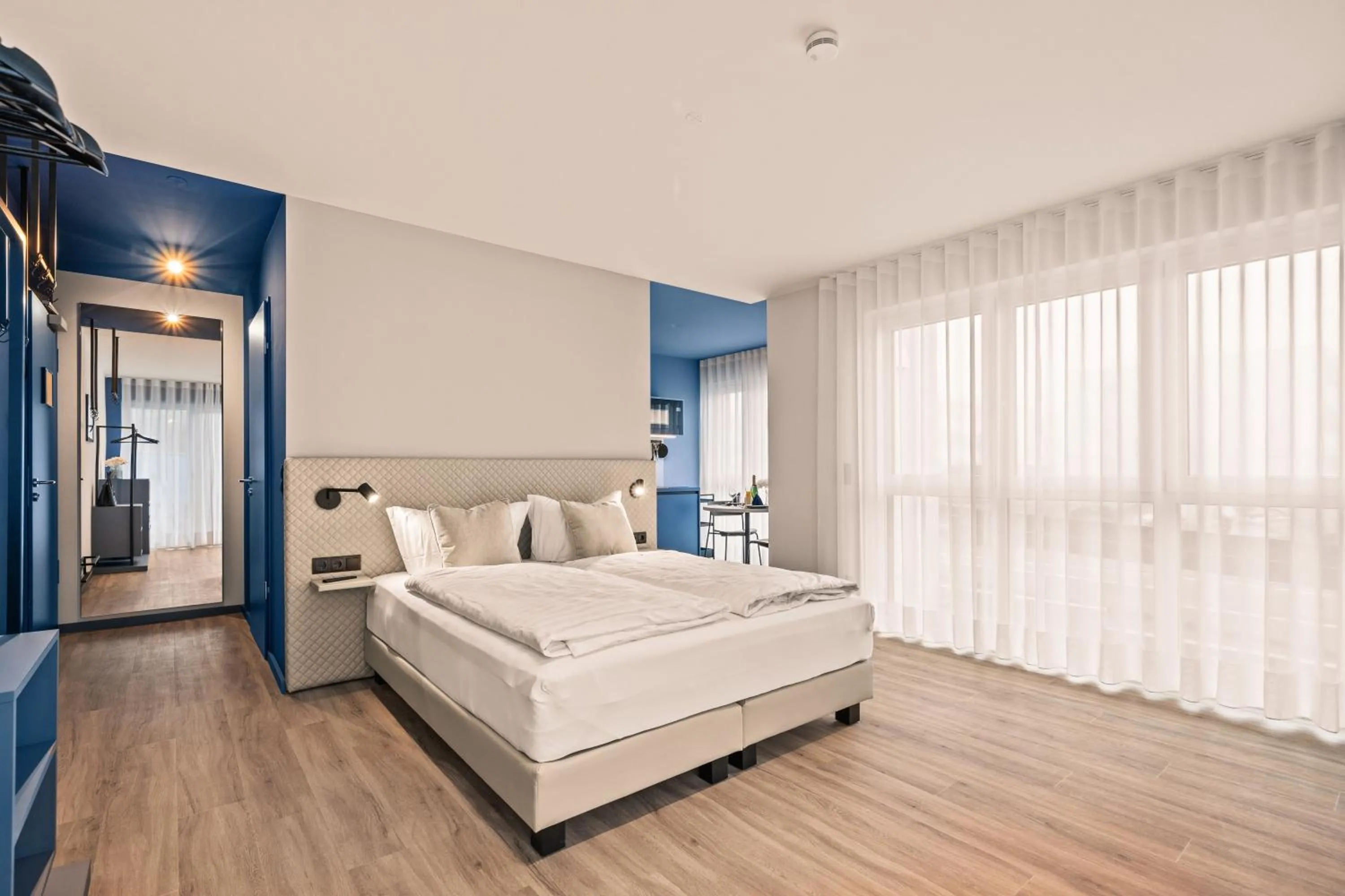 Bed in Motel42-Temporary Living