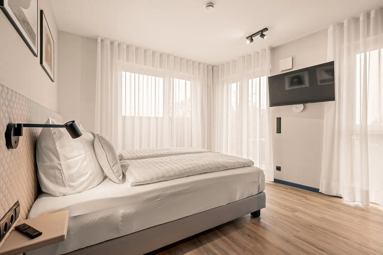 Bed in Motel42-Temporary Living
