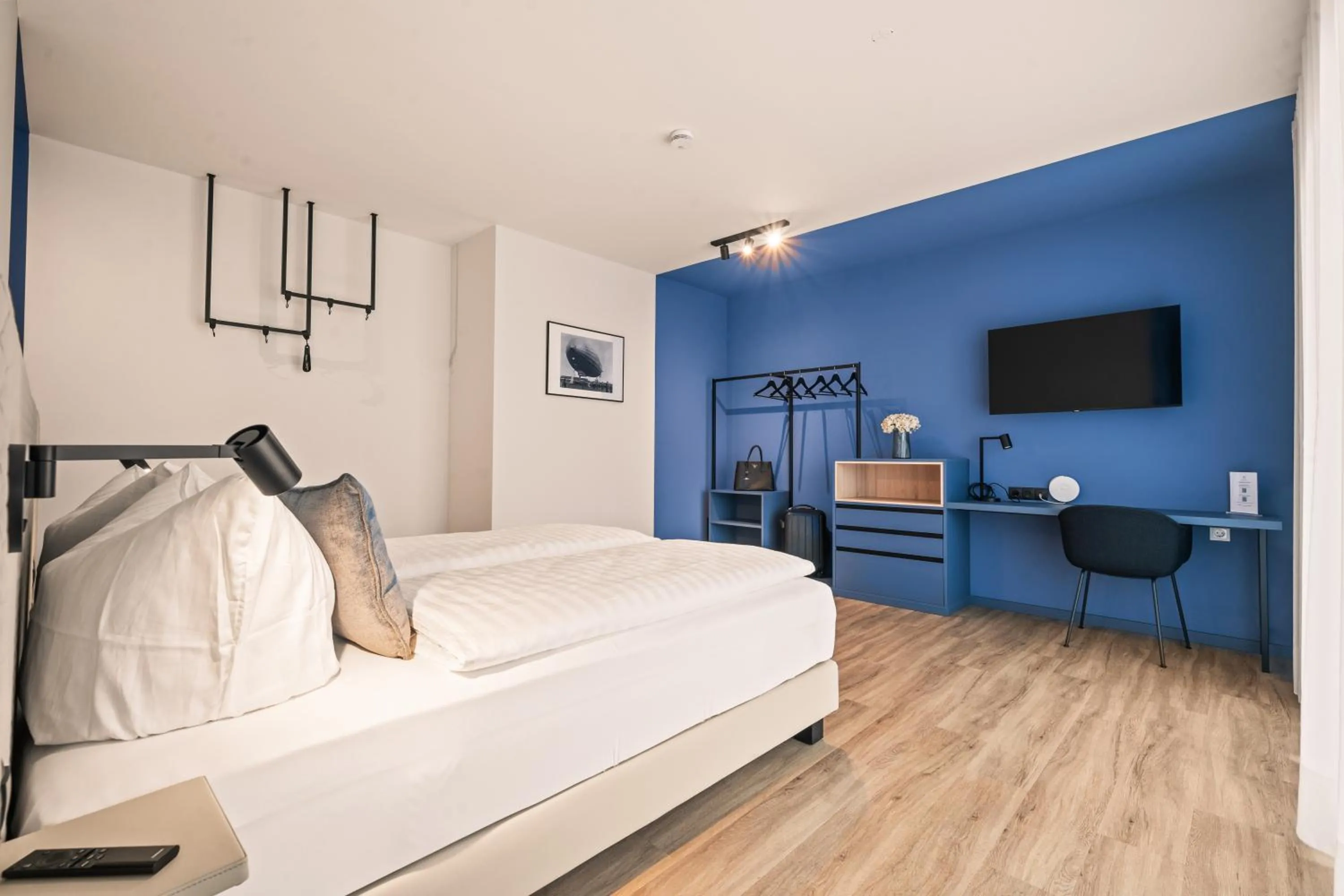Bed in Motel42-Temporary Living