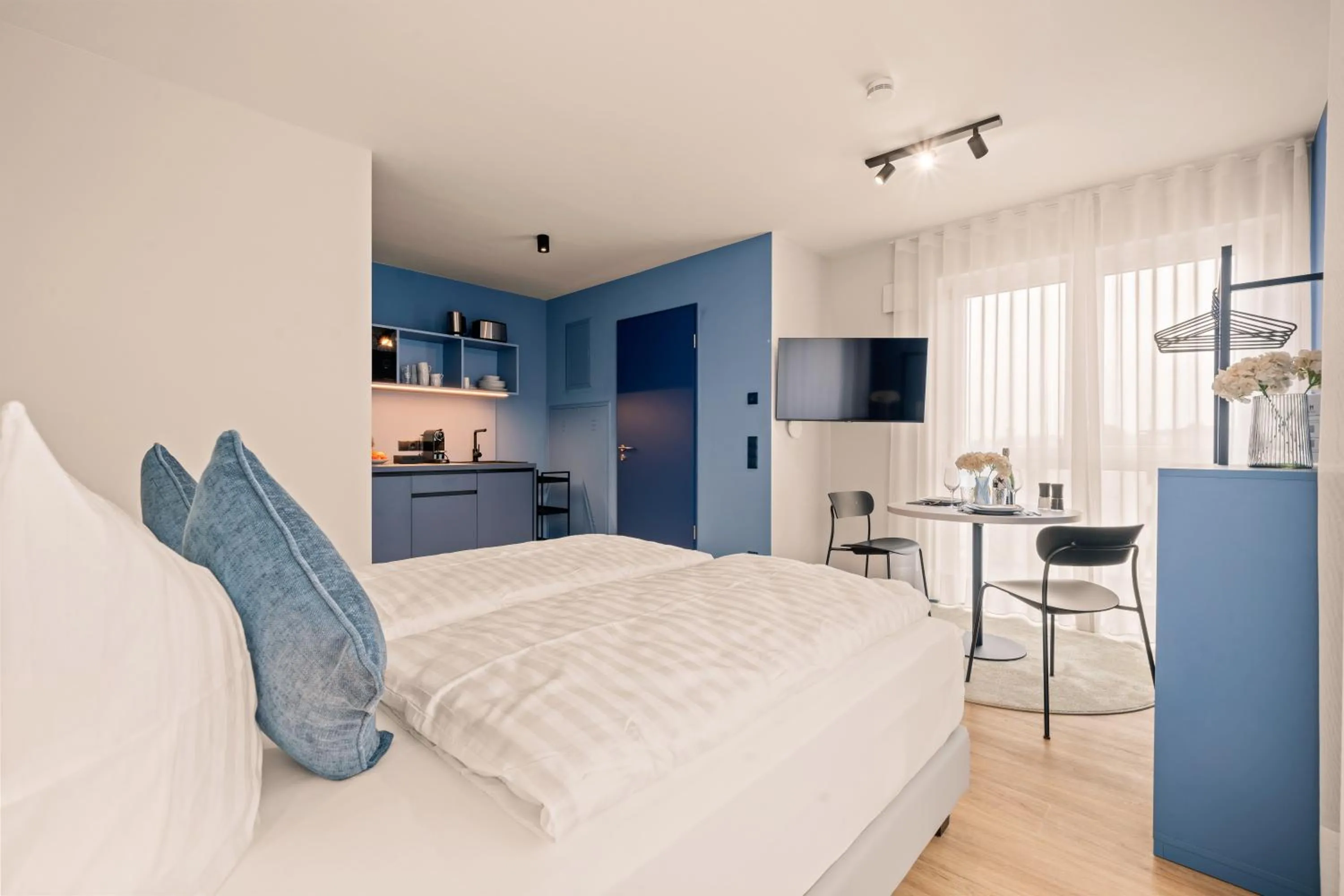Bed in Motel42-Temporary Living