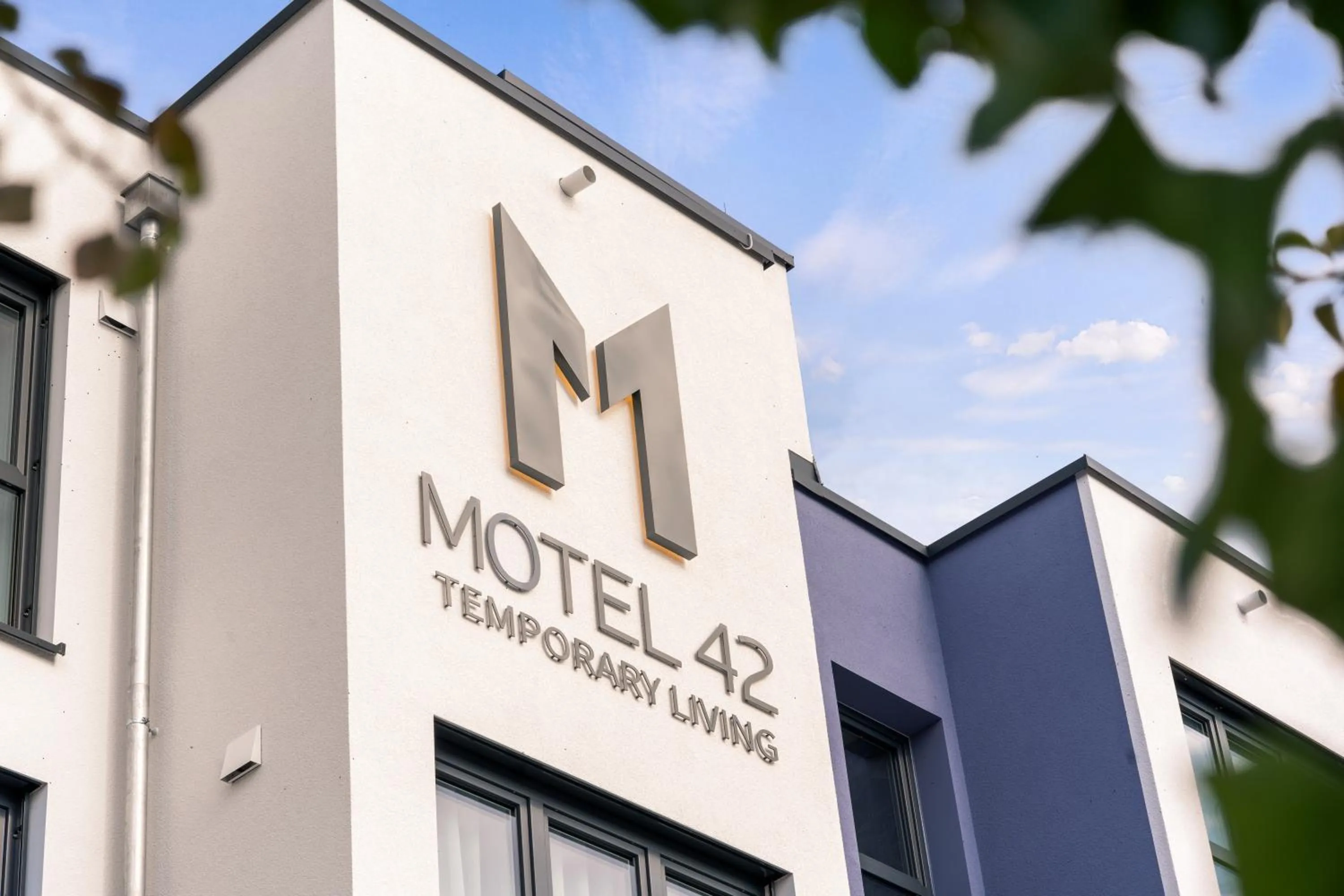 Property building in Motel42-Temporary Living