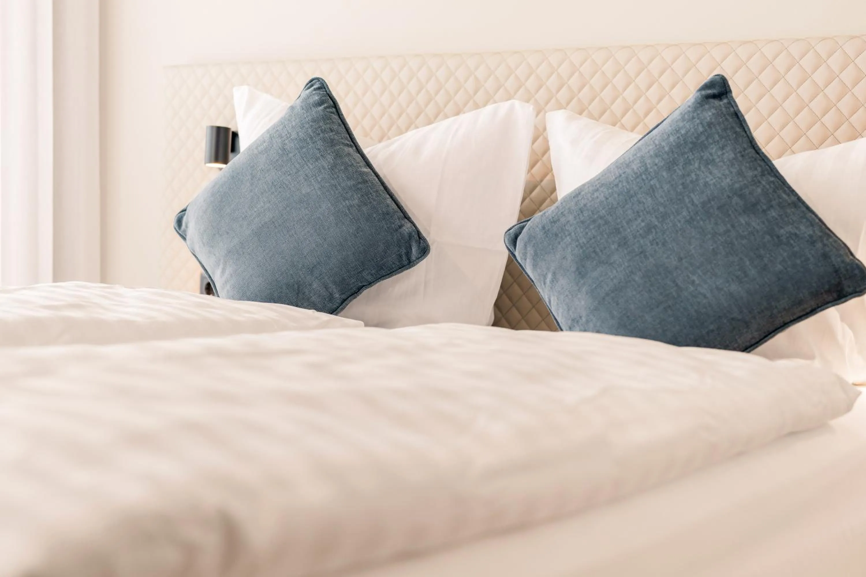 Bed in Motel42-Temporary Living