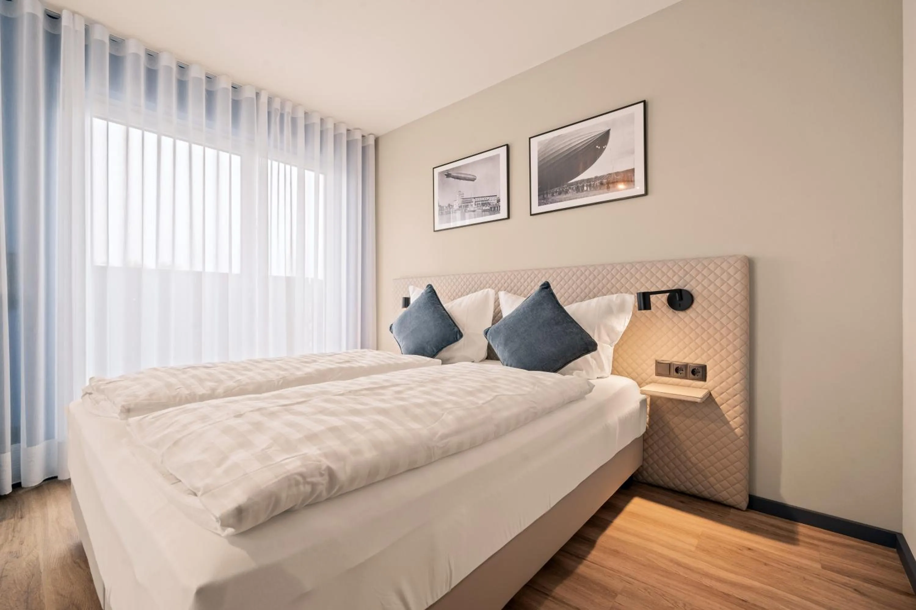 Bed in Motel42-Temporary Living