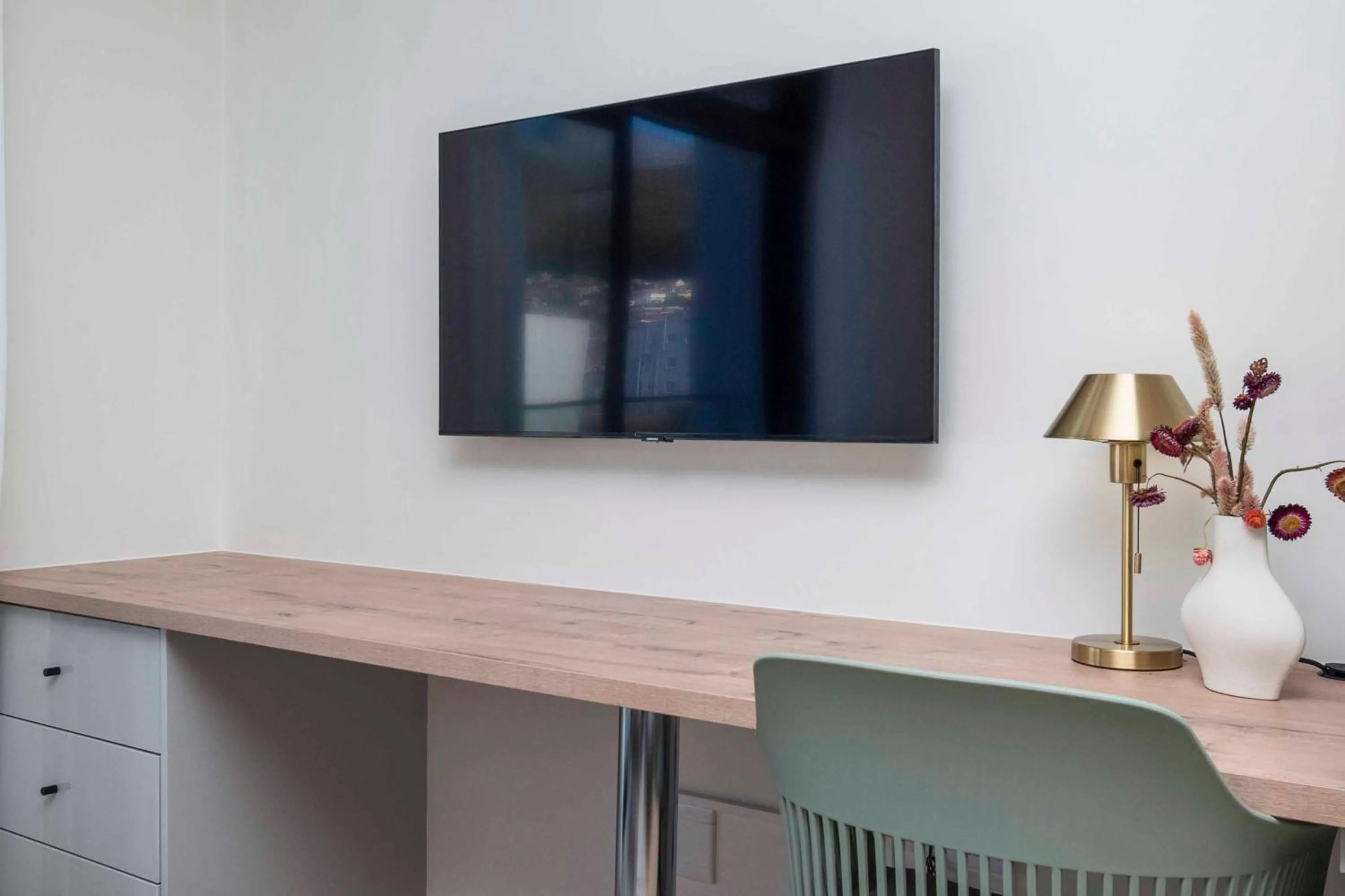 TV and multimedia in The Sage Aparthotel by Totalstay
