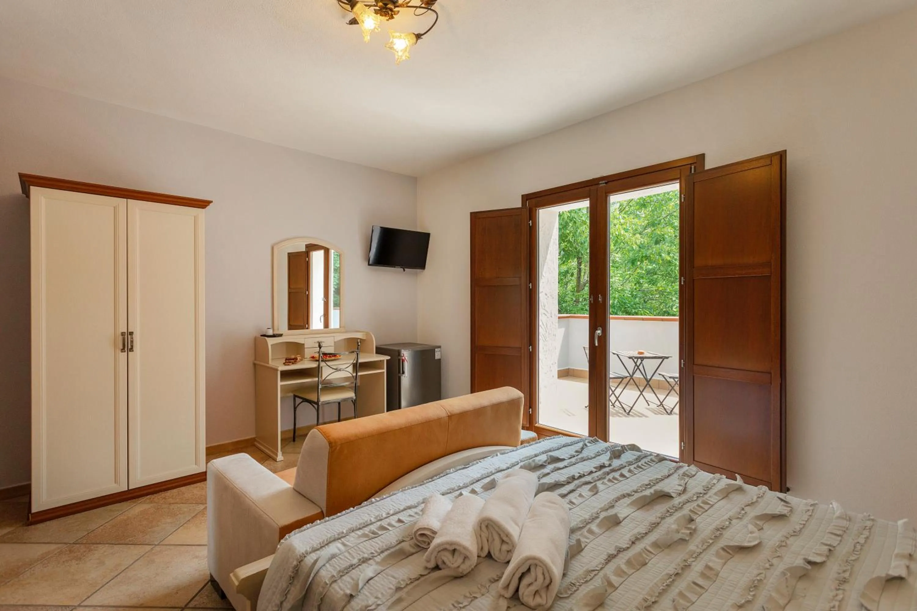 Bed in Agriturismo La Sfruscià Resort