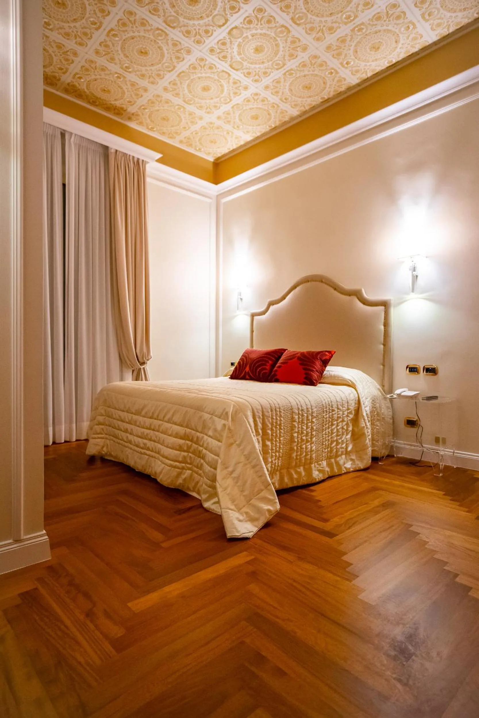 Bed in Boutique Hotel Puccini